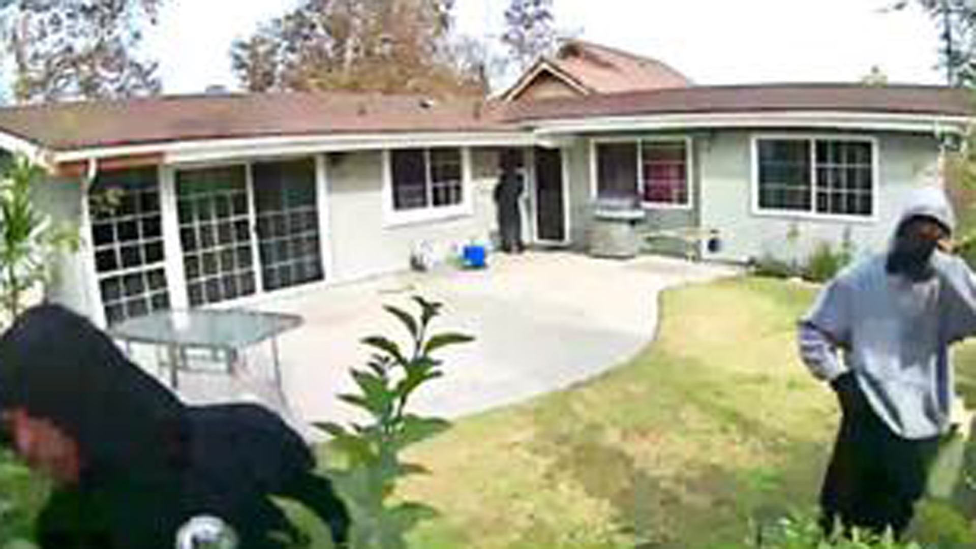 Officials from the O.C. Sheriff's Department released this image on Dec. 28, 2017, of three men who they say were trying to break into this home two days earlier.