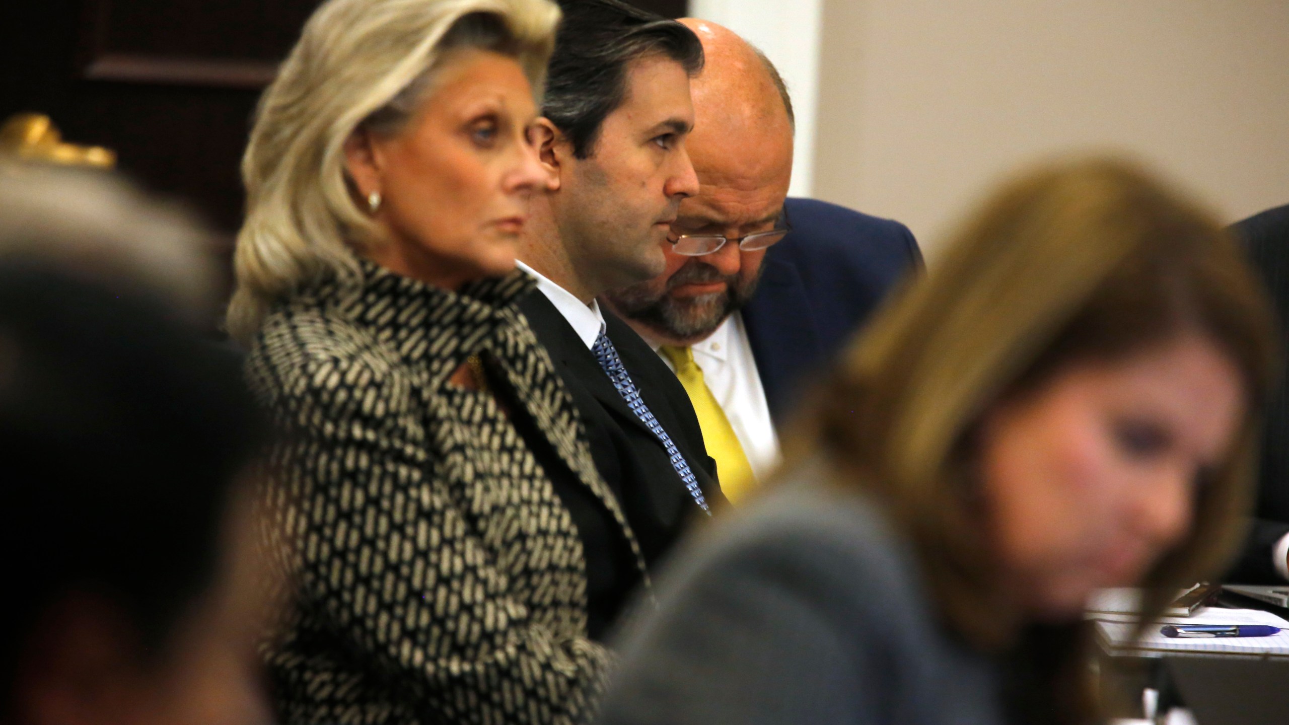 Defense attorney Miller Shealy, right, and assistant Cheryl Savage sit with former North Charleston police officer Michael Slager, center, after a note was sent by the jury as they continue to deliberate at the Charleston County court in Charleston, S.C., Dec. 5, 2016. (Credit: Grace Beahm - Pool/Getty Images)