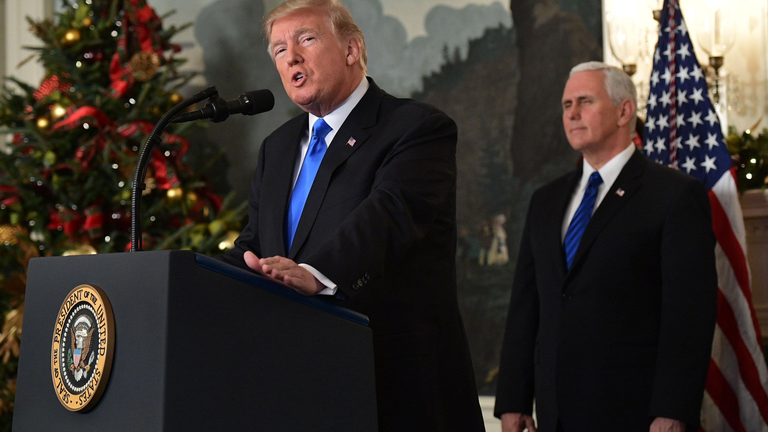 Donald Trump delivers a statement on Jerusalem from the Diplomatic Reception Room of the White House on Dec. 6, 2017 as Vice President Mike Pence looks on. (Credit: Mandel Ngan/AFP/Getty Images)