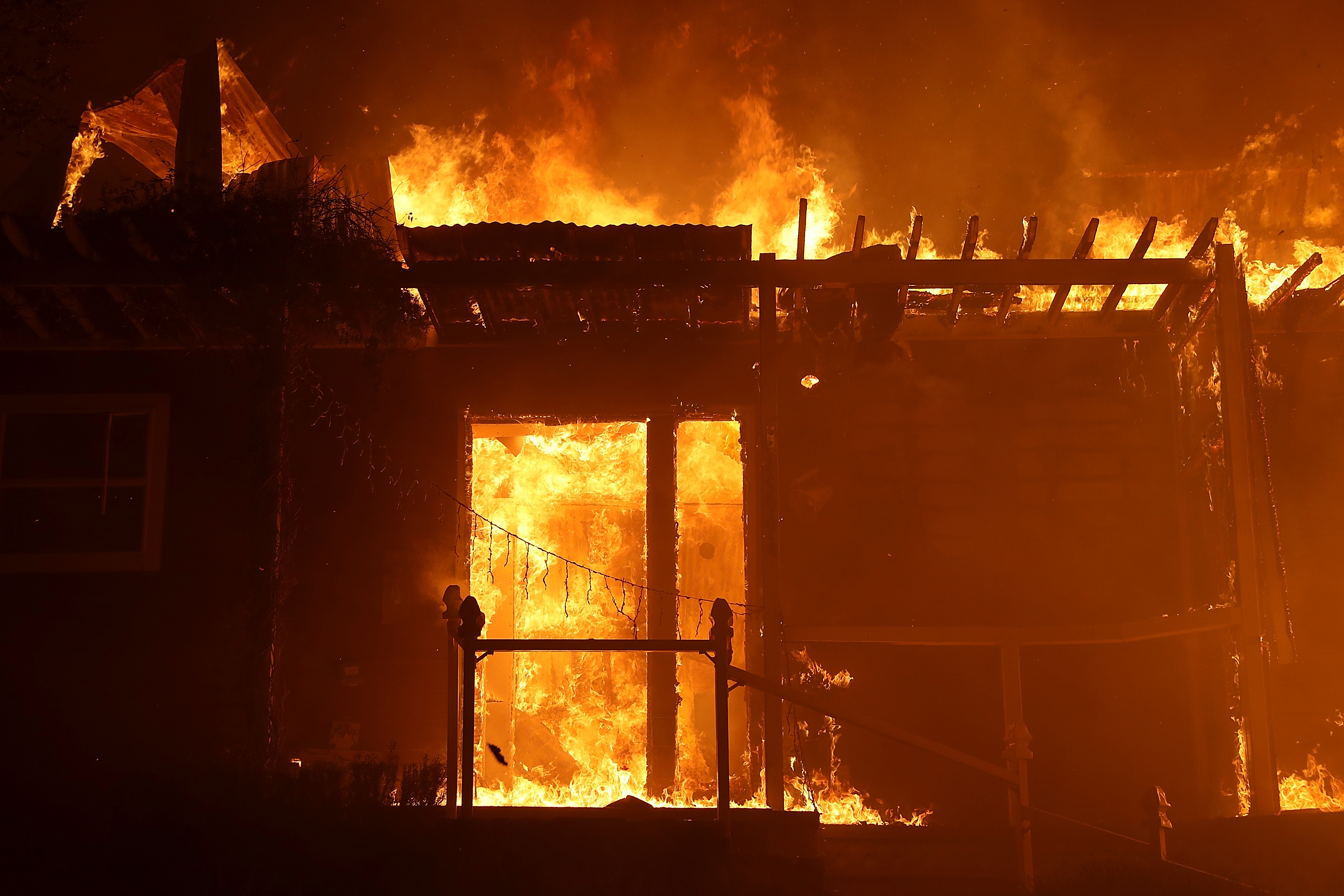 A home is consumed by fire during the Thomas fire on Dec. 7, 2017, in Ojai. (Credit: Justin Sullivan/Getty Images)