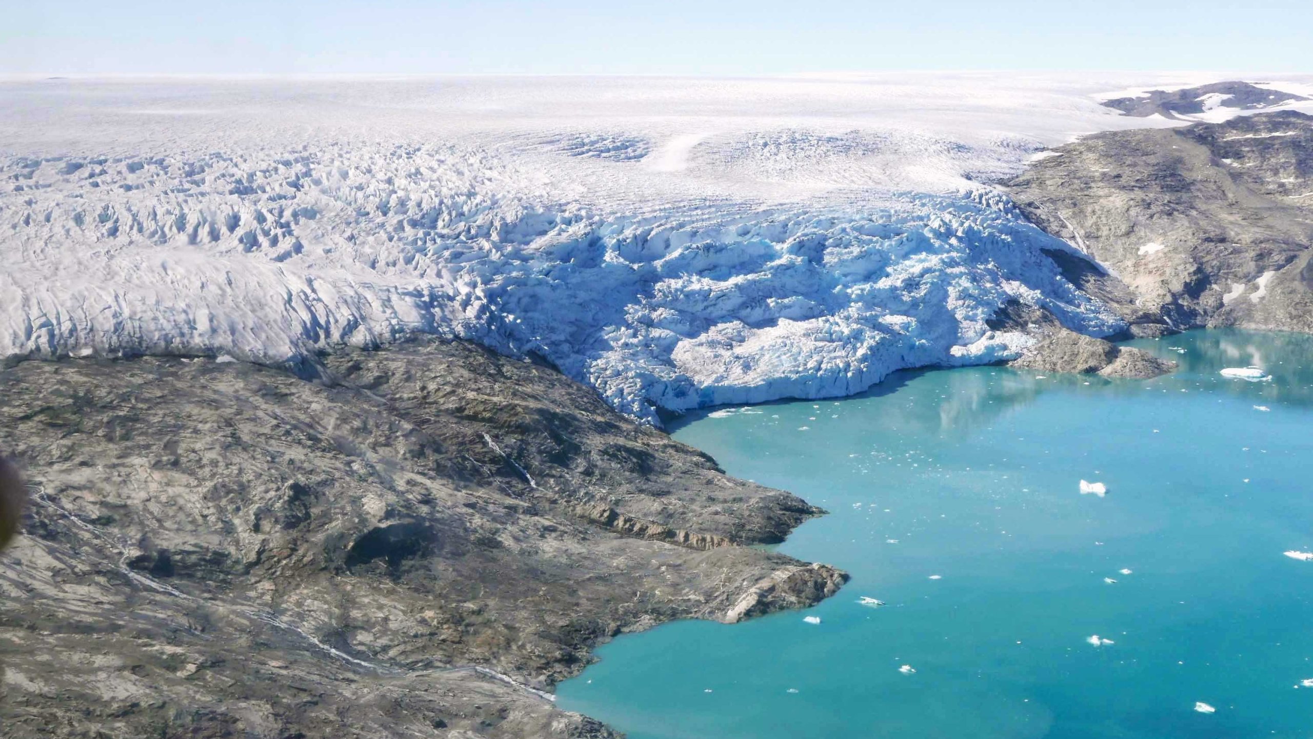 Ice flows from Helheim Glacier into Sermilik Fjord, in eastern Greenland. (Credit: Christian Steib/CNN)