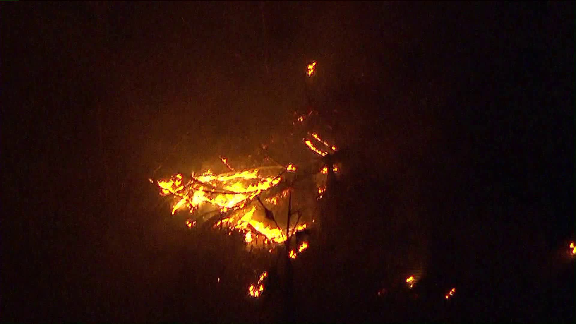 The Skirball Fire flares in Bel-Air on Dec. 6, 2017. (Credit: KTLA)