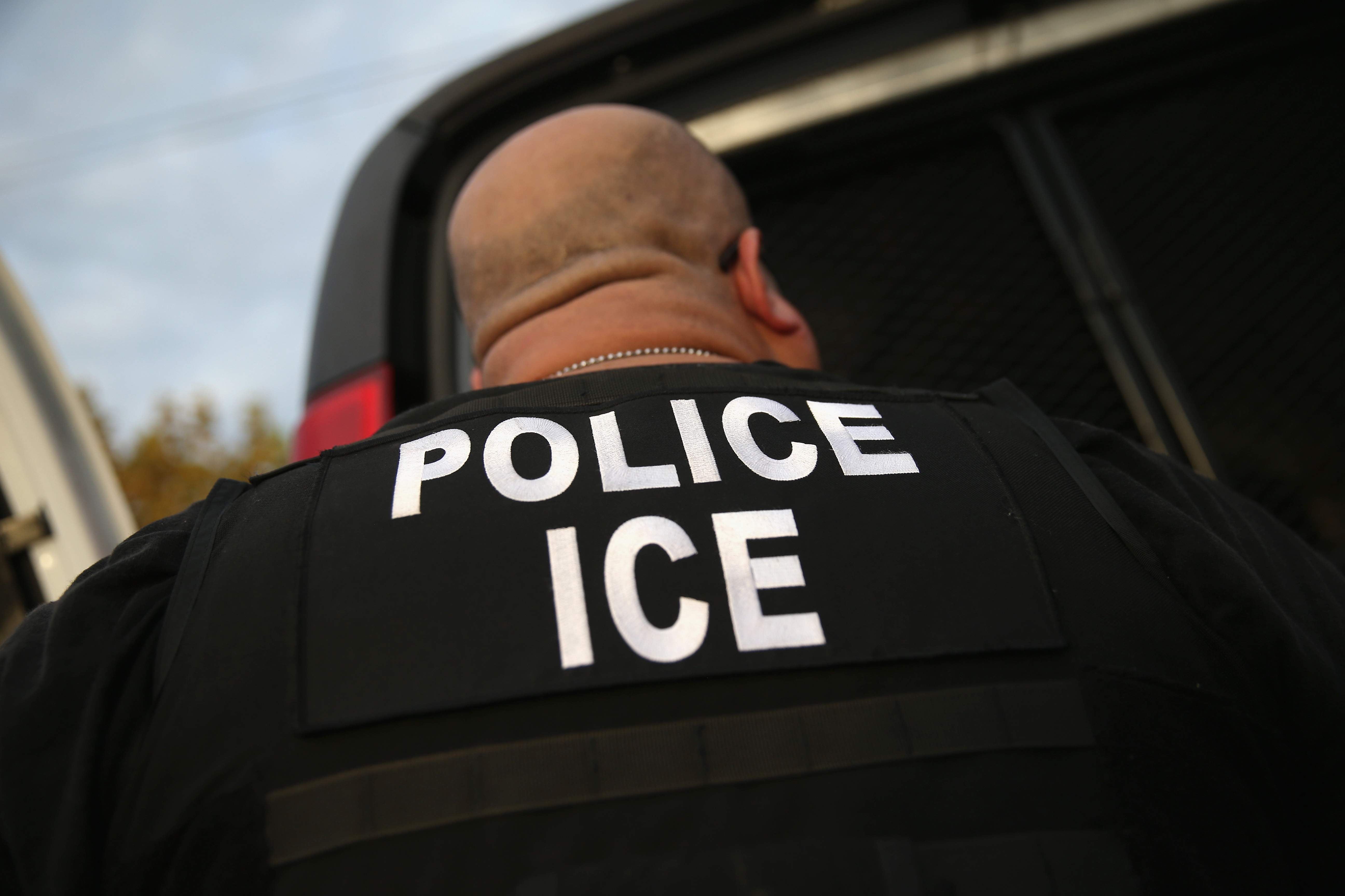 U.S. Immigration and Customs Enforcement agents detain an immigrant on Oct. 14, 2015, in Los Angeles. (Credit: John Moore/Getty Images)