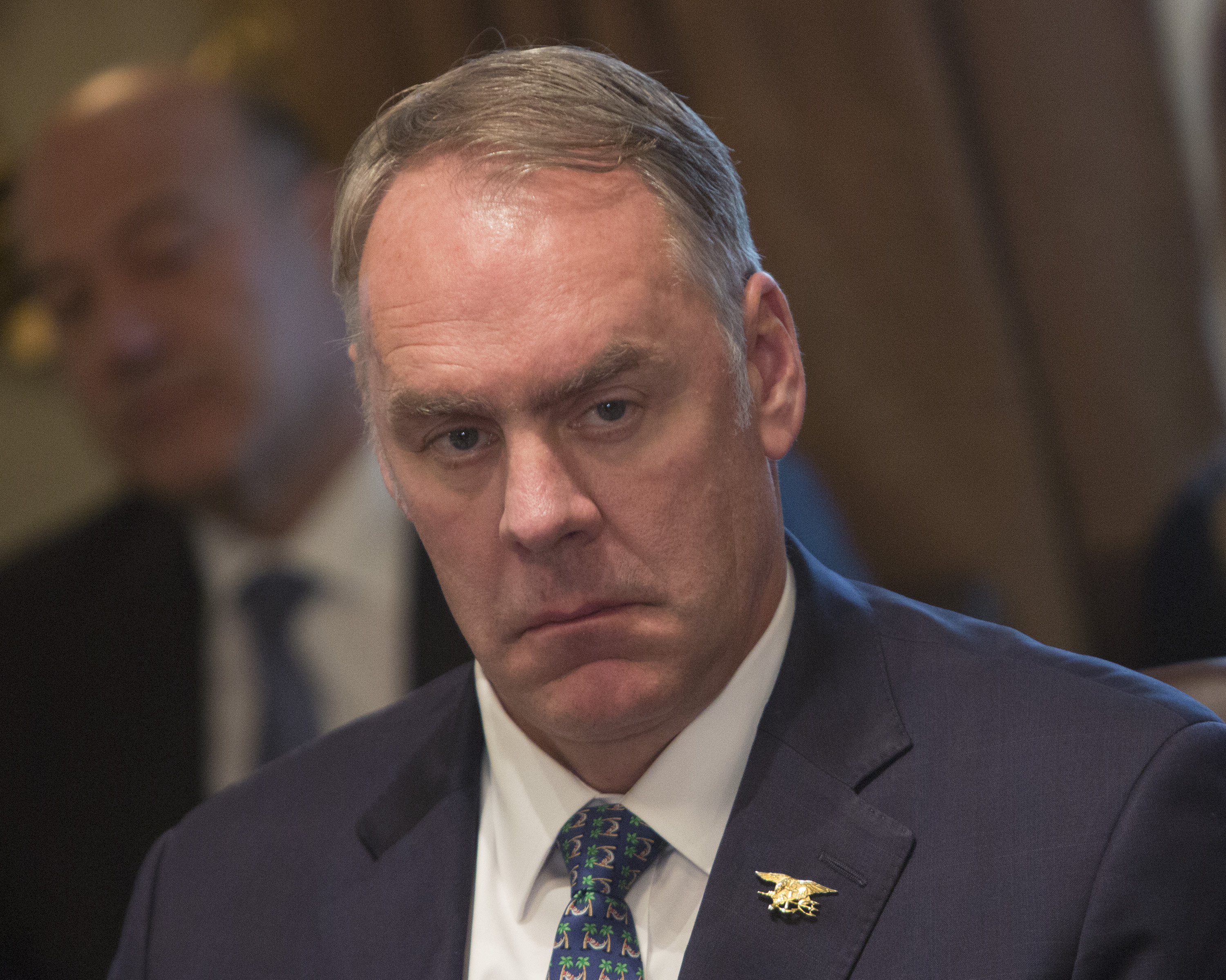 U.S. Secretary of the Interior Ryan Zinke listens during a Cabinet meeting at the White House on Dec. 20, 2017 in Washington, D.C. (Credit: Chris Kleponis-Pool/Getty Images)