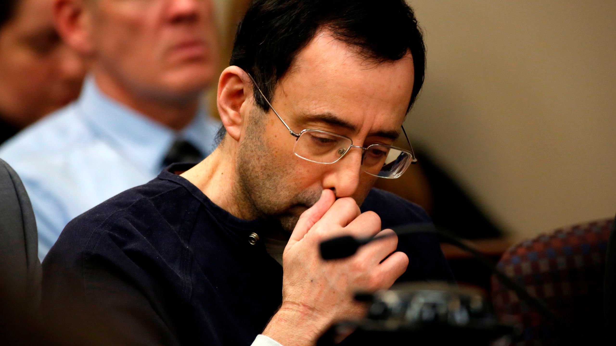 Former Michigan State University and USA Gymnastics doctor Larry Nassar addresses the court during the sentencing phase in Ingham County Circuit Court on January 24, 2018 in Lansing, Michigan. (Credit: JEFF KOWALSKY/AFP/Getty Images)