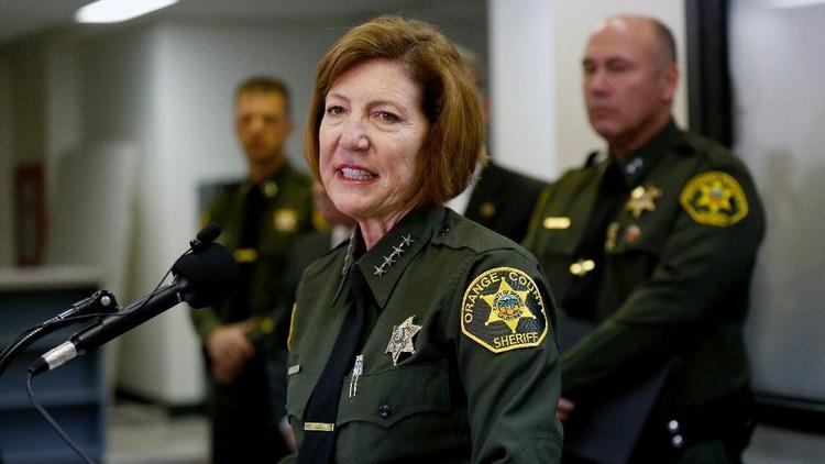 Orange County Sheriff Sandra Hutchens speaks during a news conference in 2016 in Santa Ana. (Credit: Gary Coronado / Los Angeles Times)