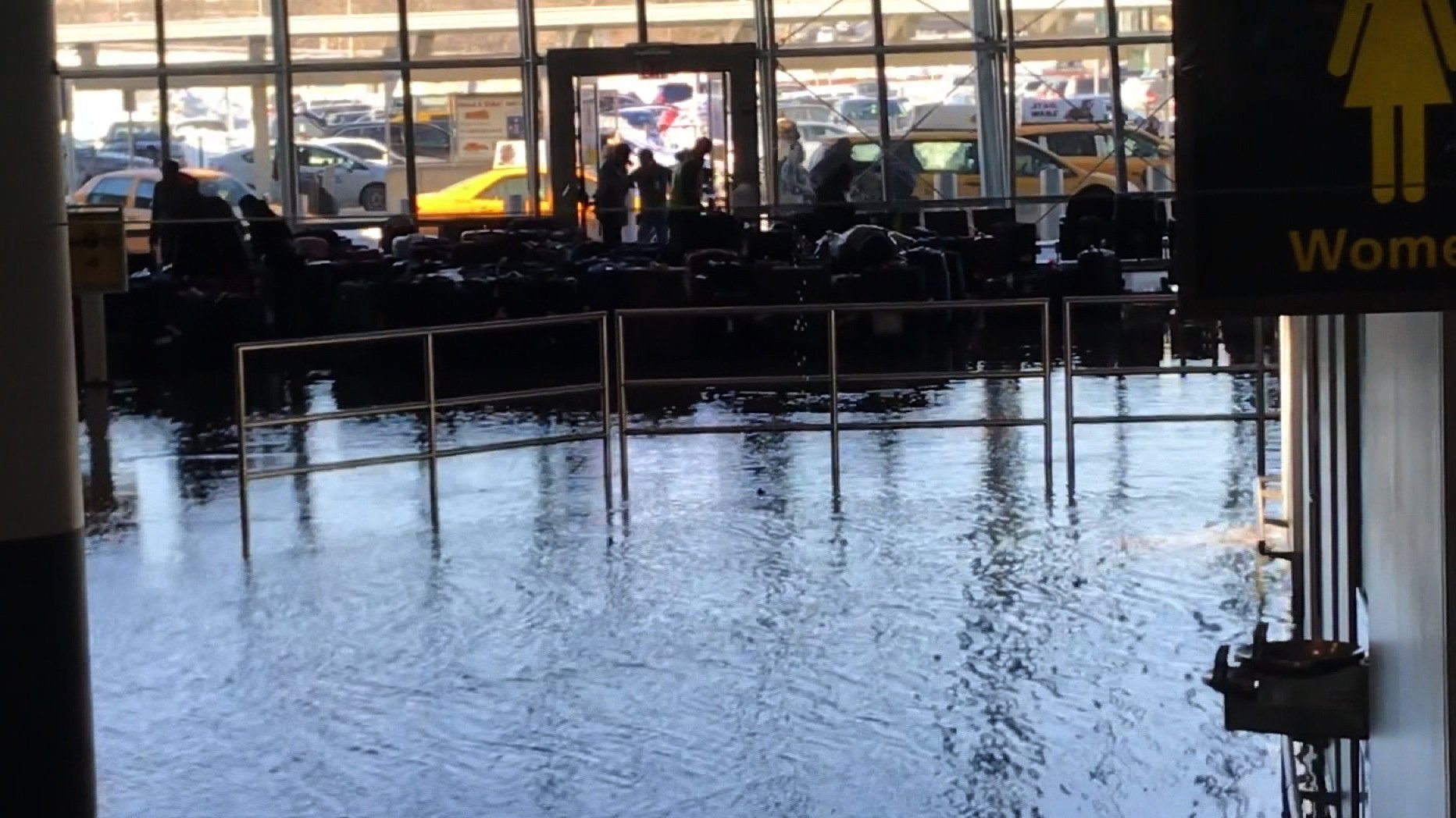 Flooding at JFK Airport in a baggage claim area is seen on Jan. 7, 2018. (Credit: CNN)