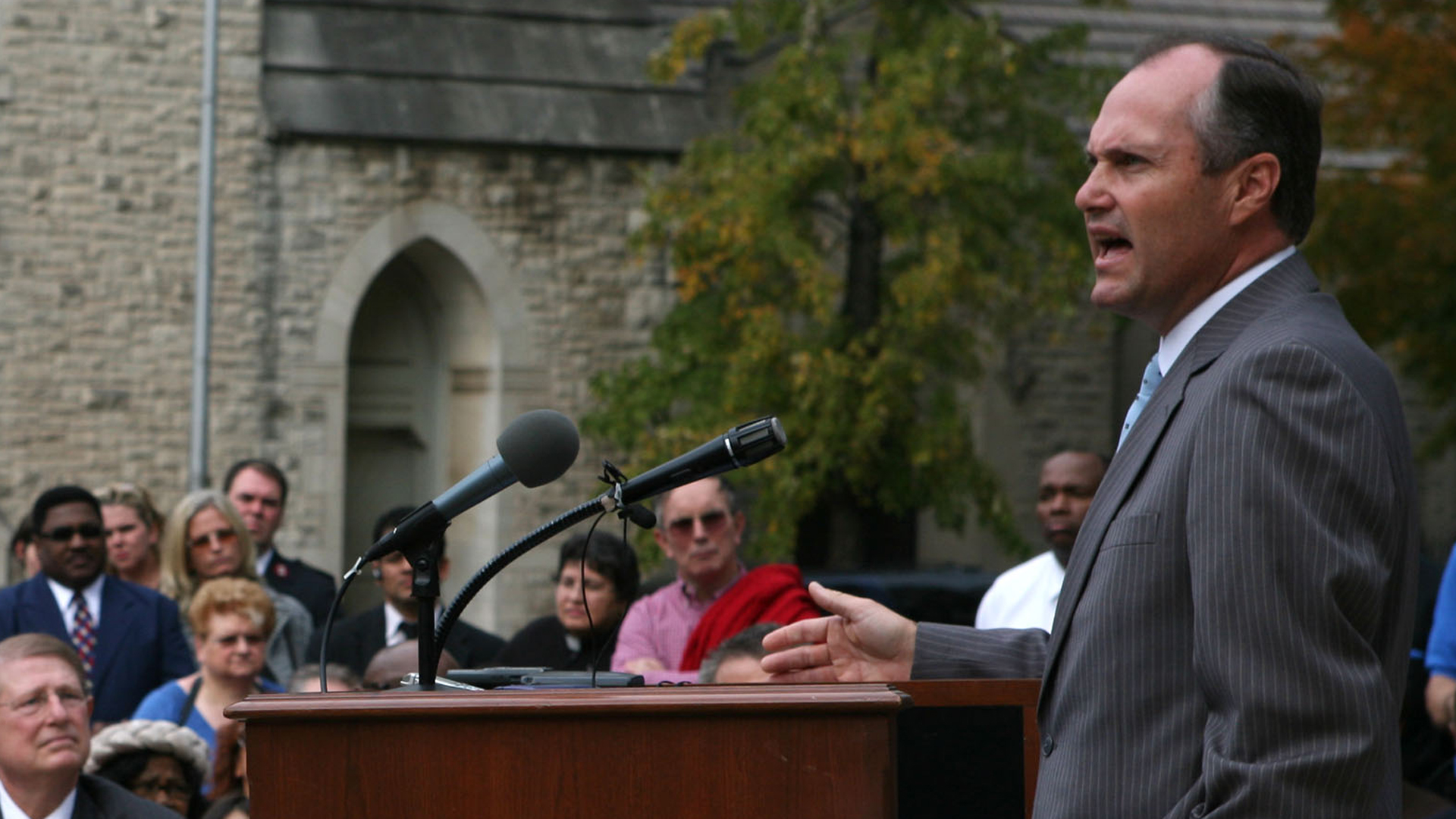 Georgia's Lieutenant Governor Casey Cagle (R) speaks to a crowd, including Governor Sonny Perdue and First Lady Mary Perdue, during a prayer service for rain amid a severe drought, on the steps of the Georgia State Capitol in Atlanta on Nov. 13, 2007. (Credit: Jessica McGowan/Getty Images)