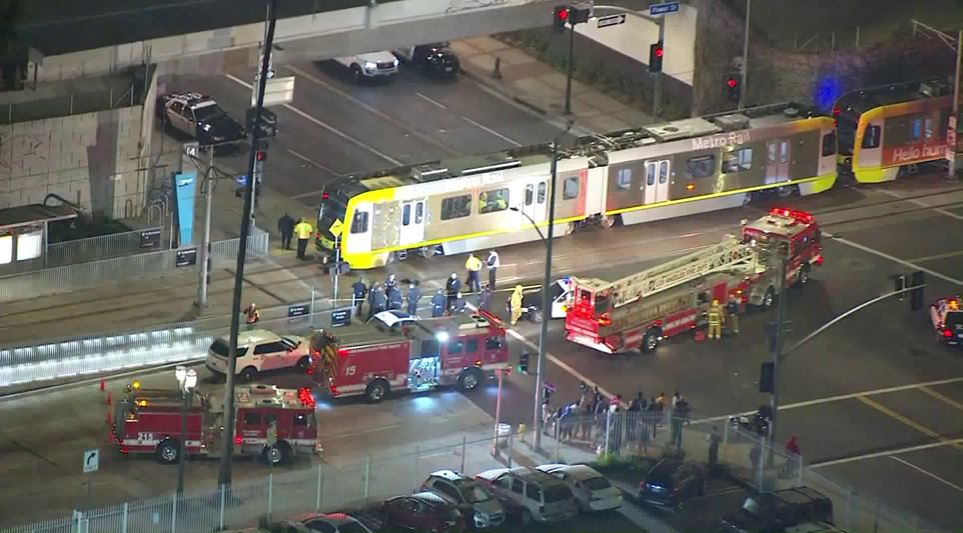 Los Angeles police and fire officials respond to the scene of a light rail train crash in South Los Angeles on Feb. 6, 2018. (Credit: KTLA)