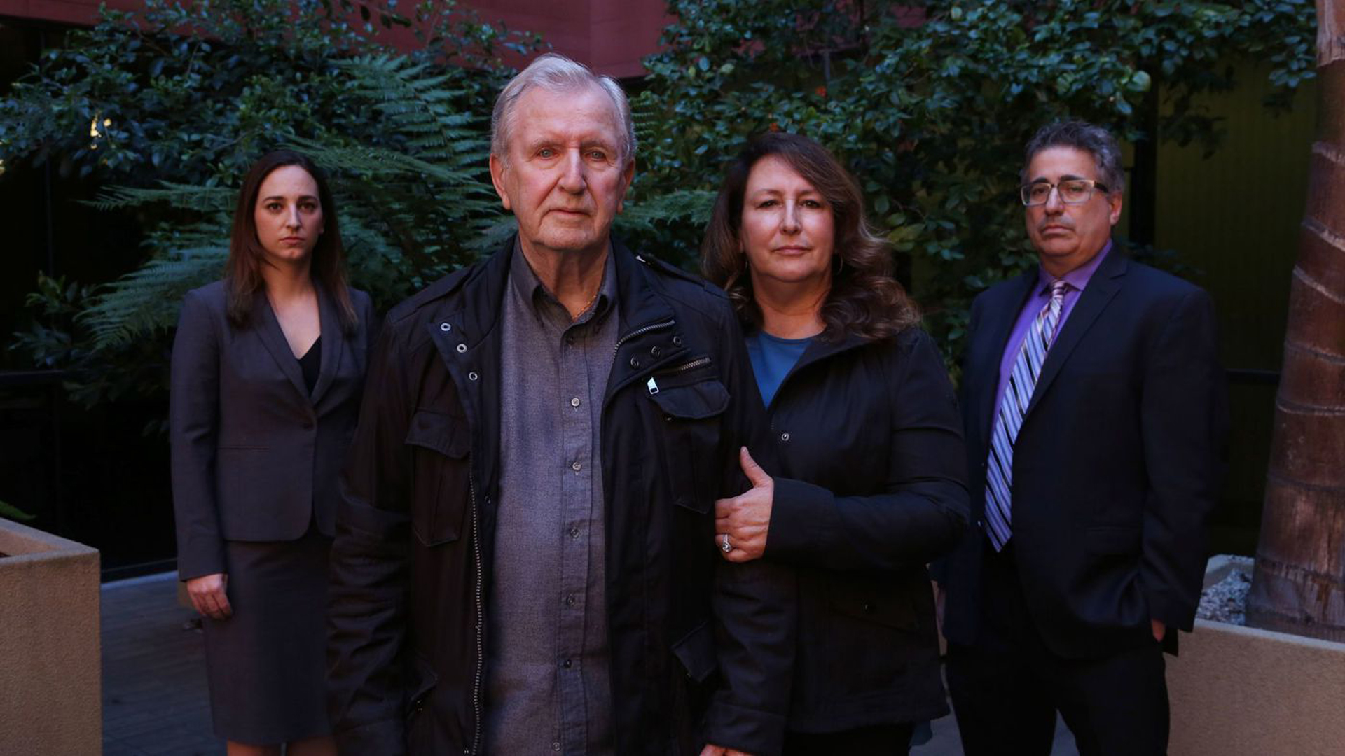 Francis Kerrigan and Carole Meikle, center, and their lawyers Ryann E. Hall, left, and V. James DeSimone, contend the Orange County coroner switched one dead homeless man's body for another to cover up a botched death notification last May. "It's a horror show on top of a horror show," Kerrigan said. (Credit: Katie Falkenberg / Los Angeles Times)