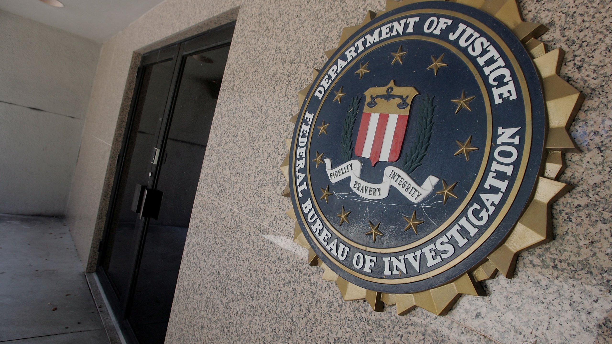 The FBI logo is seen at a building in Miami, Florida. (Photo by Joe Raedle/Getty Images)