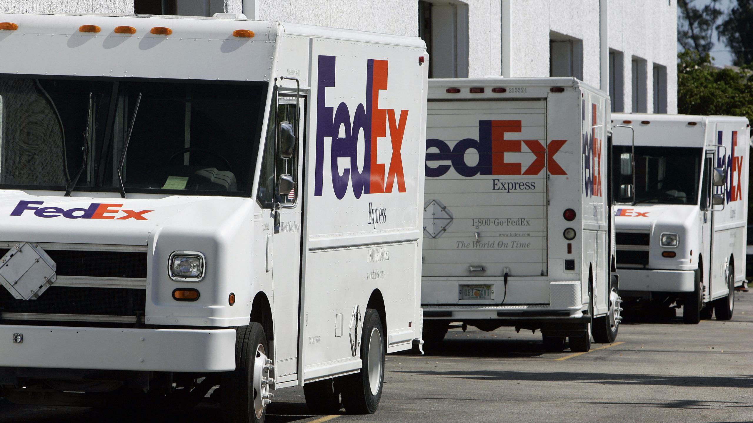 Fedex trucks sit outside a distribution site on Nov. 9, 2006 in Miami, Florida. (Credit: ROBERT SULLIVAN/AFP/Getty Images)