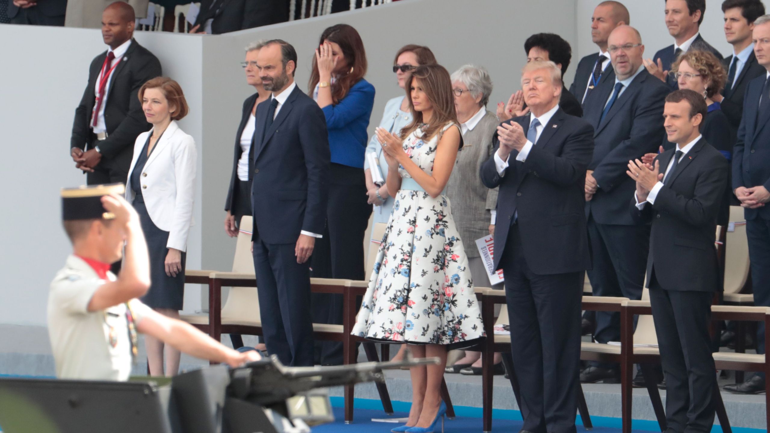 From right: French President Emmanuel Macron, President Donald Trump, First lady Melania Trump, French Prime Minister Edouard Philippe and French Defense Minister Florence Parly attend the annual Bastille Day military parade on the Champs-Elysees avenue in Paris, July 14, 2017. (Credit: Joel Saget / AFP / Getty Images)