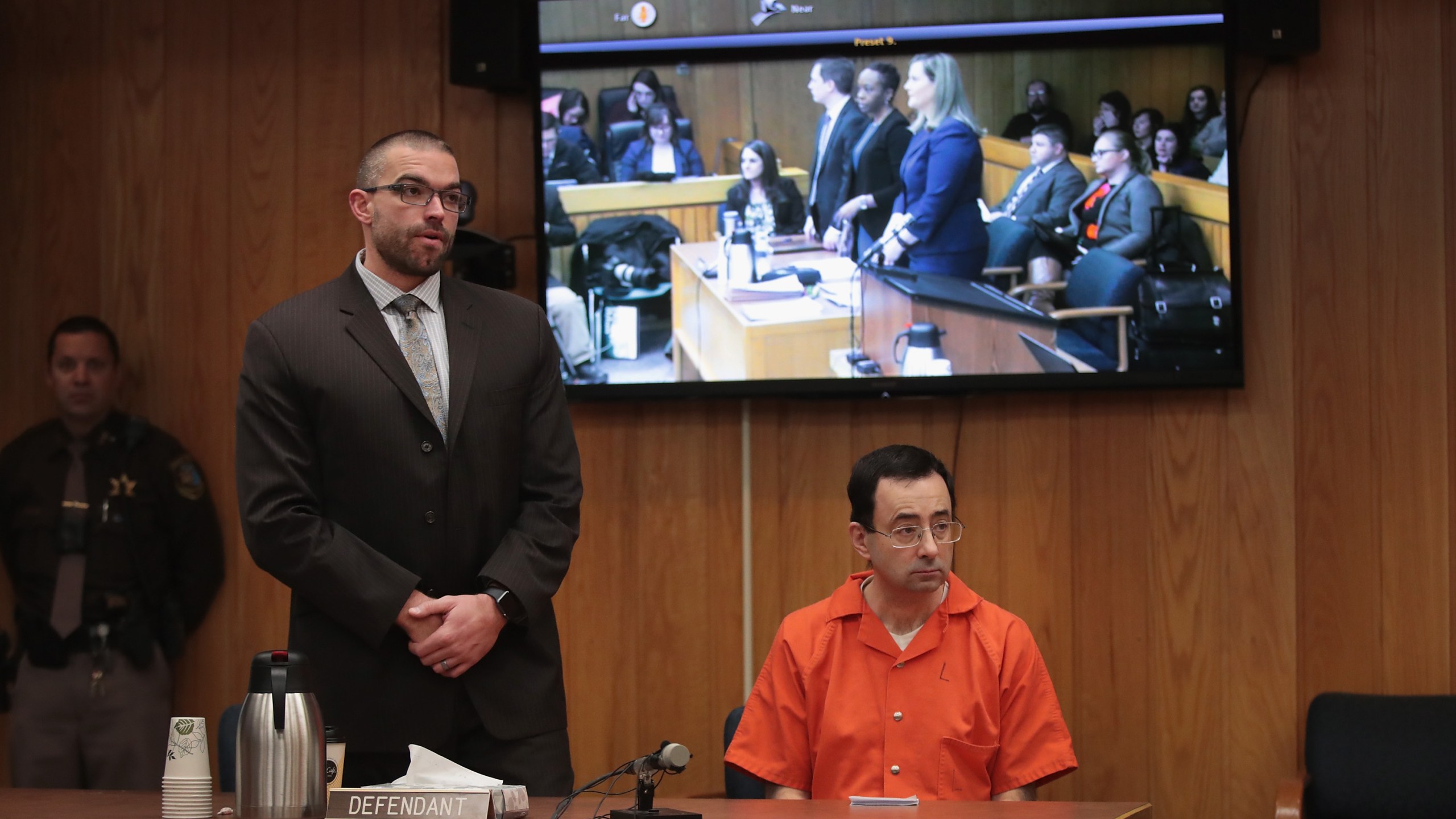 Larry Nassar sits with his attorney Matt Newburg as he is sentenced by Judge Janice Cunningham for three counts of criminal sexual assault in Eaton County Circuit Court on Feb. 5, 2018, in Charlotte, Mich. (Credit: Scott Olson/Getty Images)