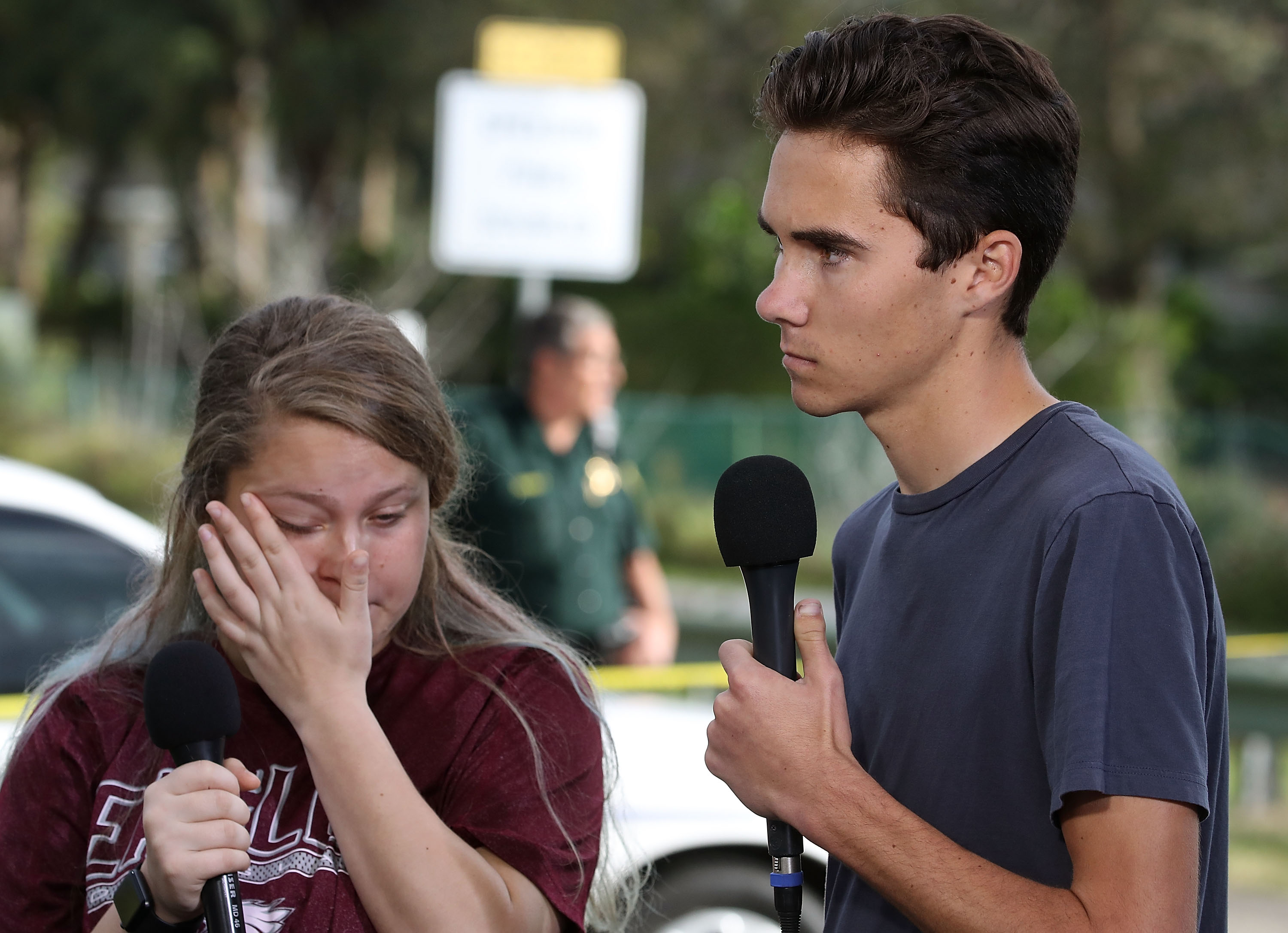 Students Kelsey Friend (L) and David Hogg recount their stories about the mass shooting at the Marjory Stoneman Douglas High School, where 17 people were killed on February 15, 2018 in Parkland, Florida. (Credit: Mark Wilson/Getty Images)