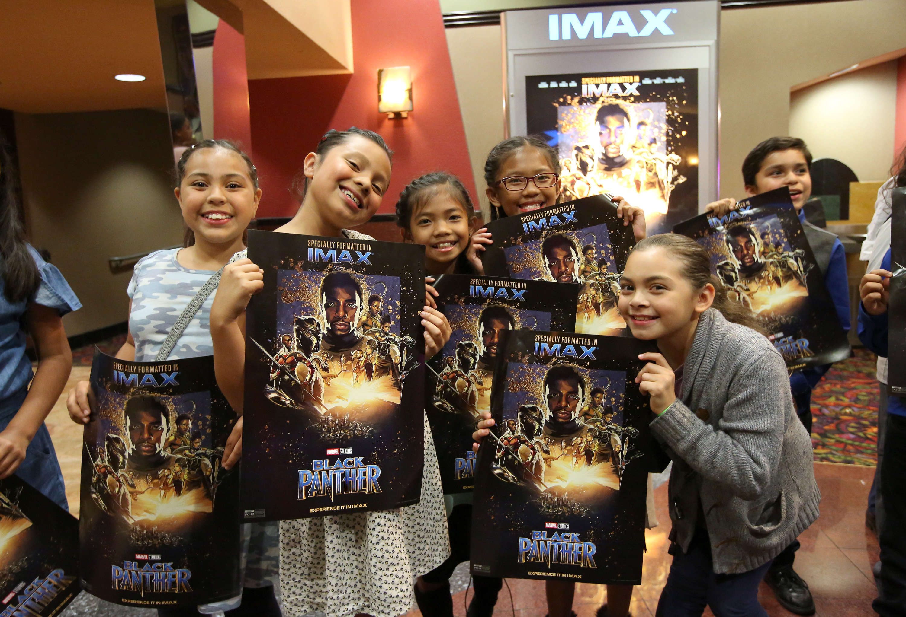 Boys & Girls Club Long Beach members received the celebrity treatment with concessions and more during an advance IMAX screening of "Black Panther" on Feb. 15, 2018 in Long Beach. (Credit: Jesse Grant/Getty Images for IMAX)