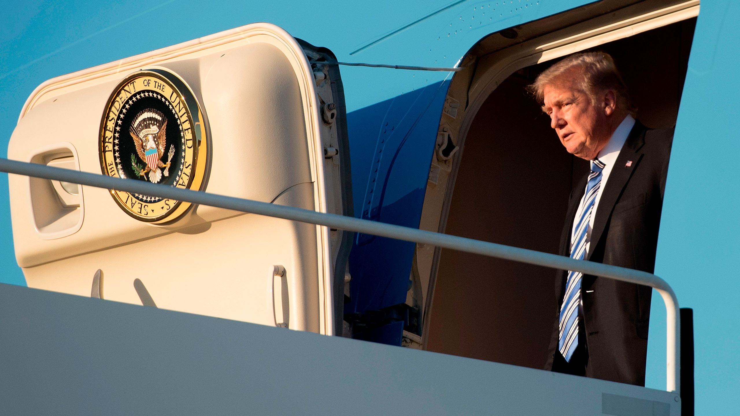 Donald Trump arrives at Palm Beach International Airport in West Palm Beach, on Feb. 16, 2018. (Credit: Jim Watson/AFP/Getty Images)