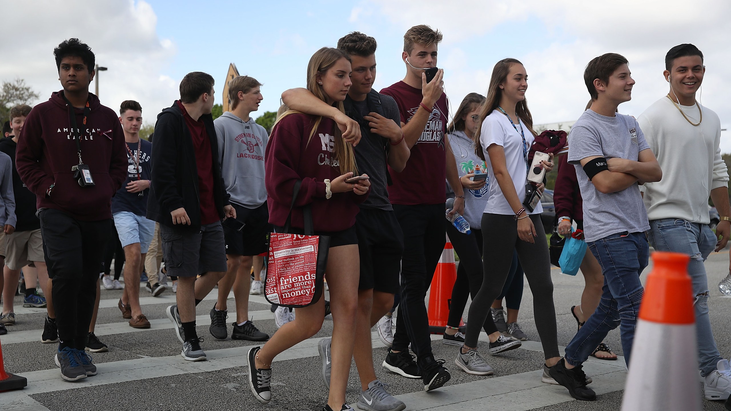 Students leave Marjory Stoneman Douglas High School after attending their classes for the first time since the shooting that killed 17 people at the school, Feb. 28, 2018, in Parkland, Florida. (Credit: Joe Raedle / Getty Images)