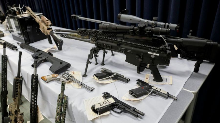 Some of the 28 firearms seized during the Feb. 14, 2018, raid of Temple City felon's home are shown during a news conference on Feb. 21. (Credit: Jay L. Clendenin / Los Angeles Times)