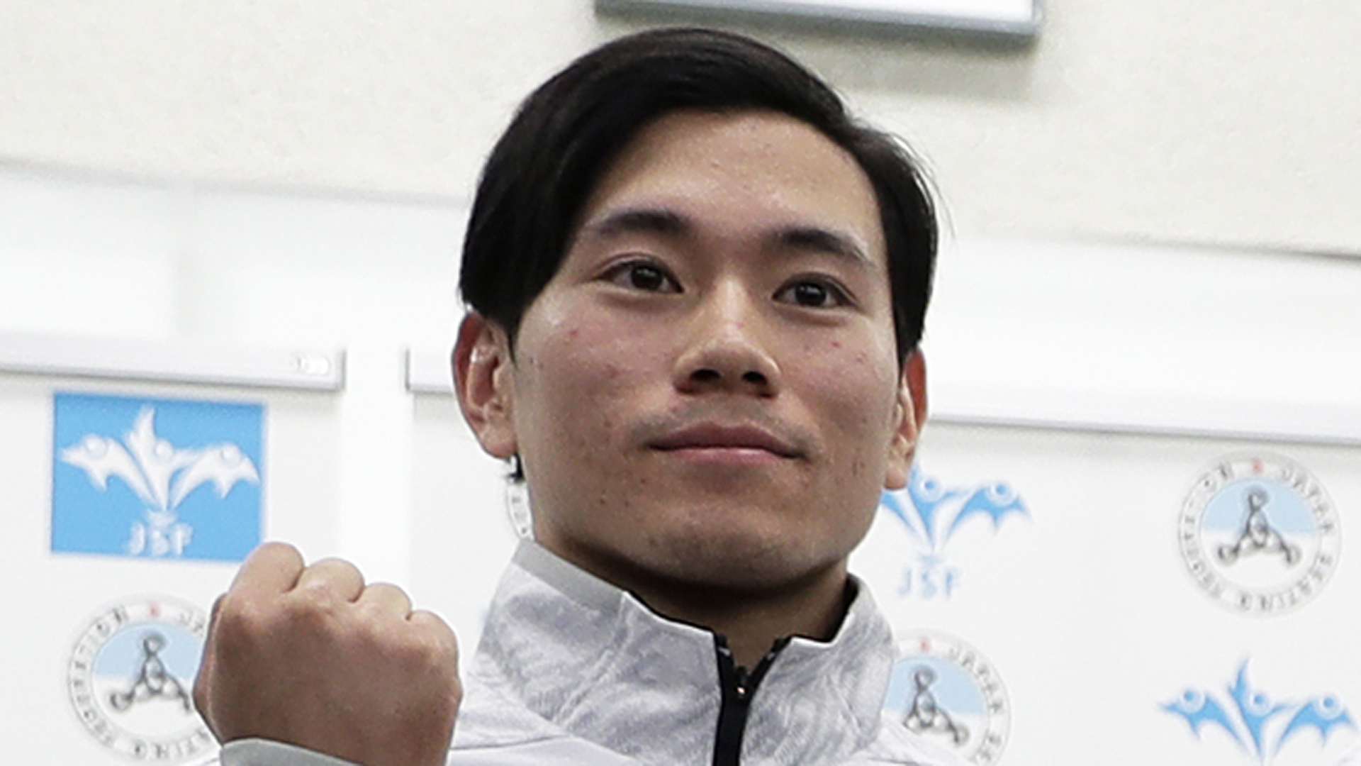 Japanese speed skater Kei Saito poses with his fist clenched for photographs during a press conference following the announcement of the Japan Short Track Speed Skating Team for the PyeongChang 2018 Winter Olympic Games after the 40th All Japan Short Track Speed Skating Championships at Nippon Gaishi Arena on Dec. 17, 2017, in Nagoya, Aichi, Japan. (Credit: Kiyoshi Ota/Getty Images)