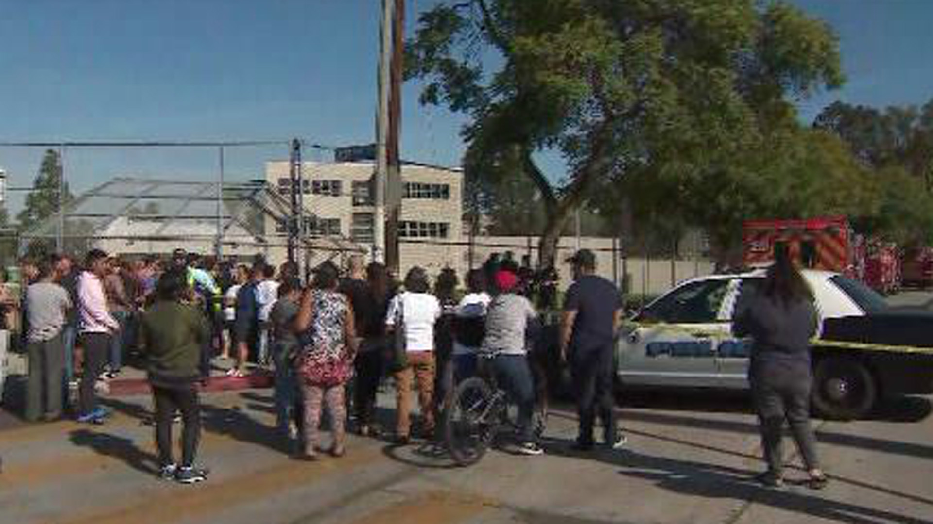 Anxious relatives wait outside Sal Castro Middle School after a shooting on Feb. 1, 2018. (Credit: KTLA)