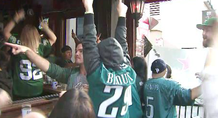 Fans gathered at dueling watch parties in Santa Monica to cheer on the New England Patriots and Philadelphia Eagles, whose fans can be seen celebrating here, during Super Bowl LII on Feb. 4, 2018. (Credit: KTLA)