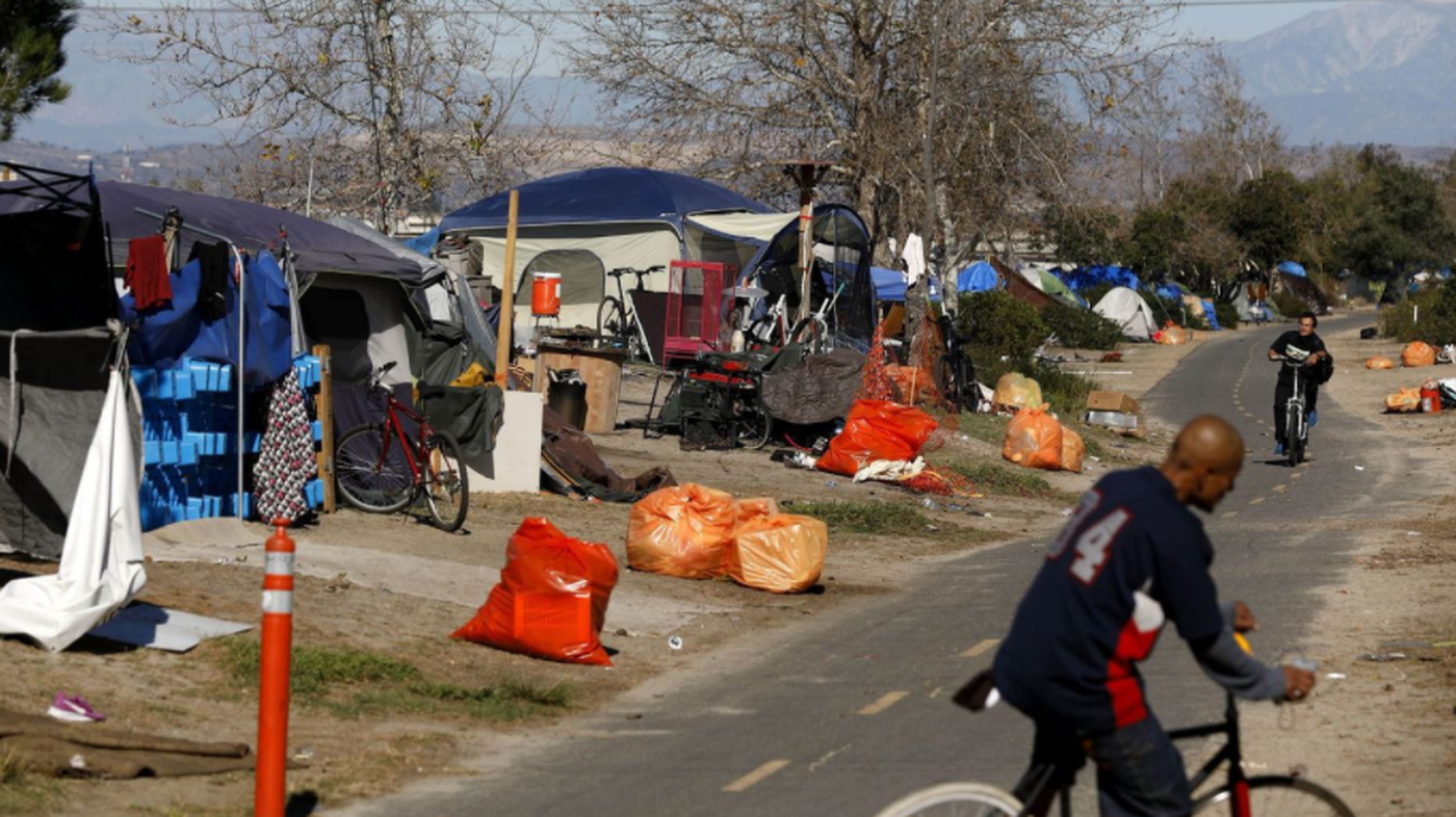 "This freaks me out. I moved to O.C. because I thought it would be a safe place. Now it's getting more and more like L.A.," said one office manager in Irvine. "Who wants tons of traffic, high prices and all kinds of unwanted people around you?" (Credit: Los Angeles Times)