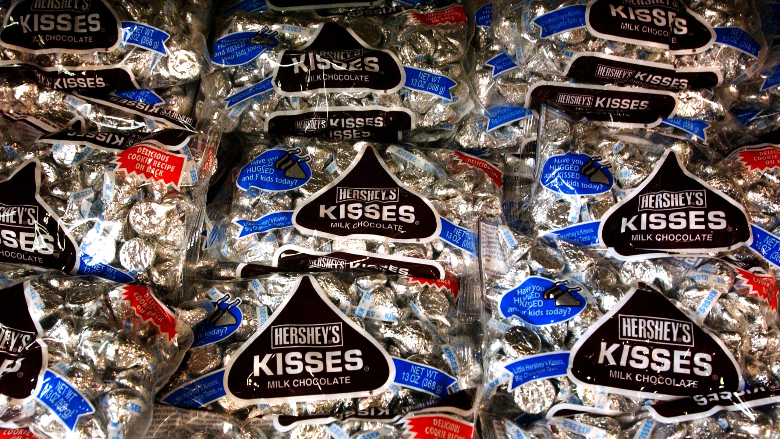 Bags of Hershey Kisses sit on a shelf at a store on Aug. 7, 2002 in Hershey, Pennsylvania. (Credit: Spencer Platt/Getty Images)