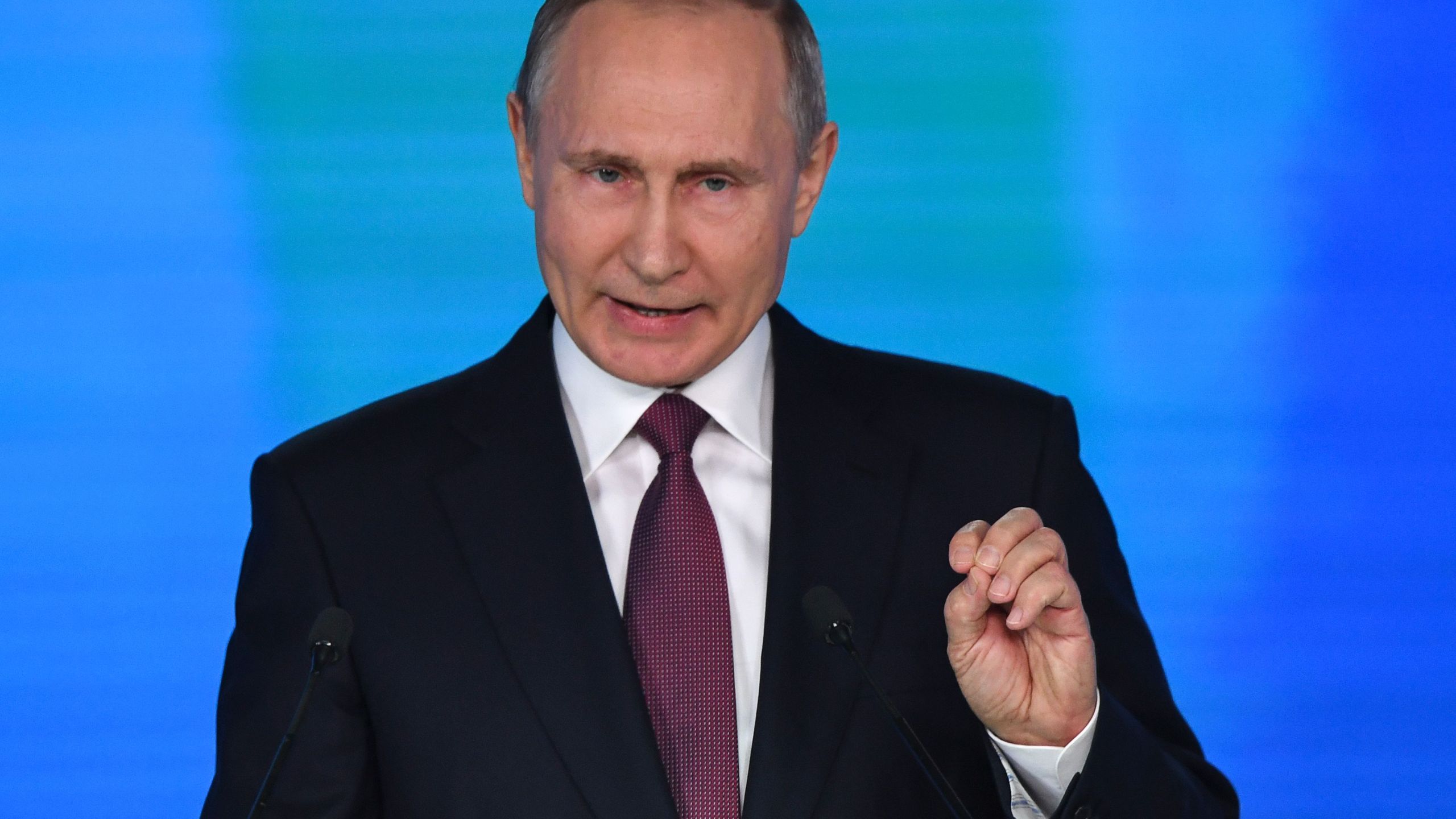 Russian President Vladimir Putin addresses the Federal Assembly at Moscow's Manezh exhibition centre on March 01, 2018. (Credit: YURI KADOBNOV/AFP/Getty Images)