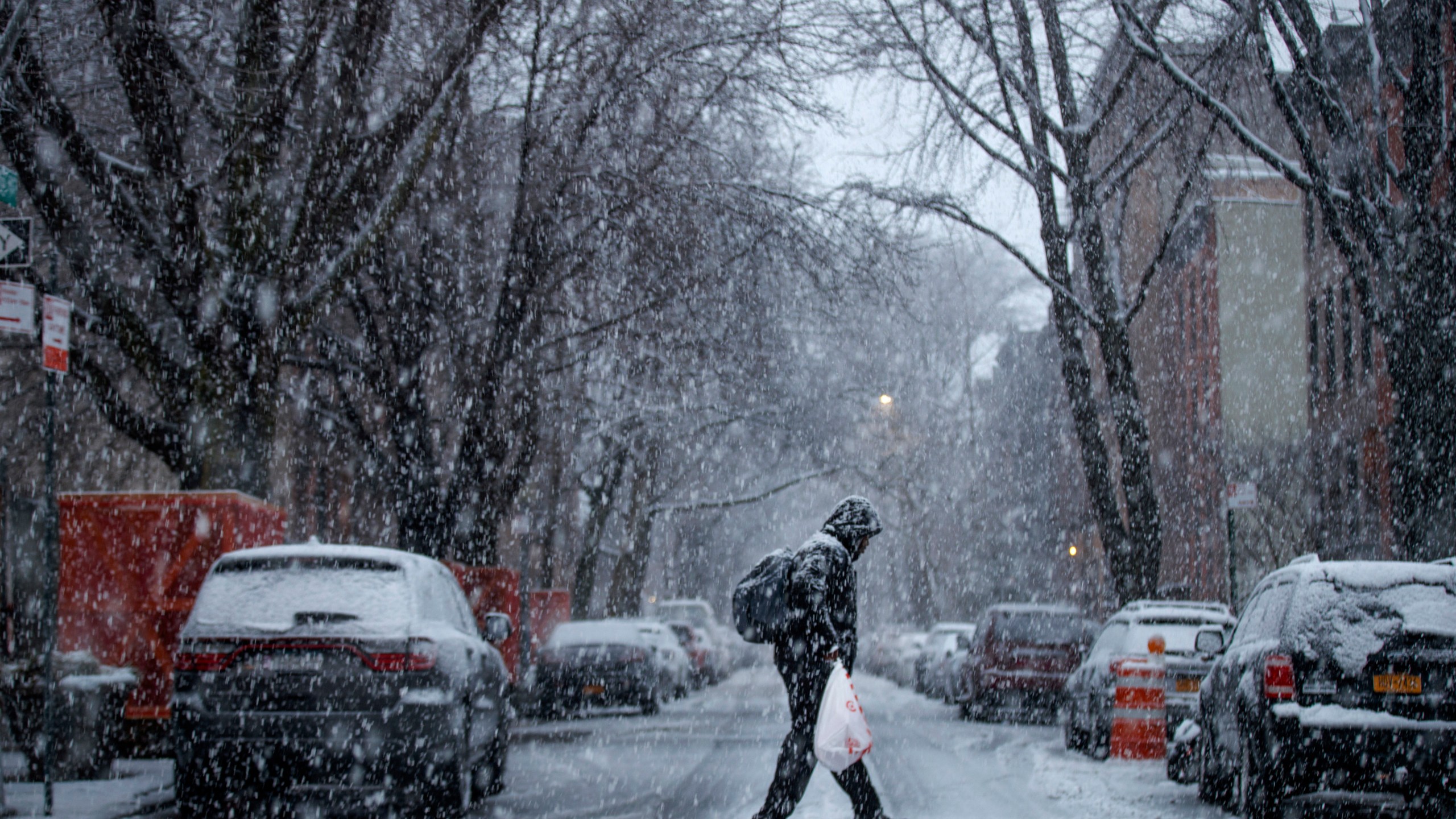 A man walks through the Boerum Hill neighborhood in Brooklyn during a snowstorm, March 7, 2018, in New York City. (Credit: Drew Angerer/Getty Images)