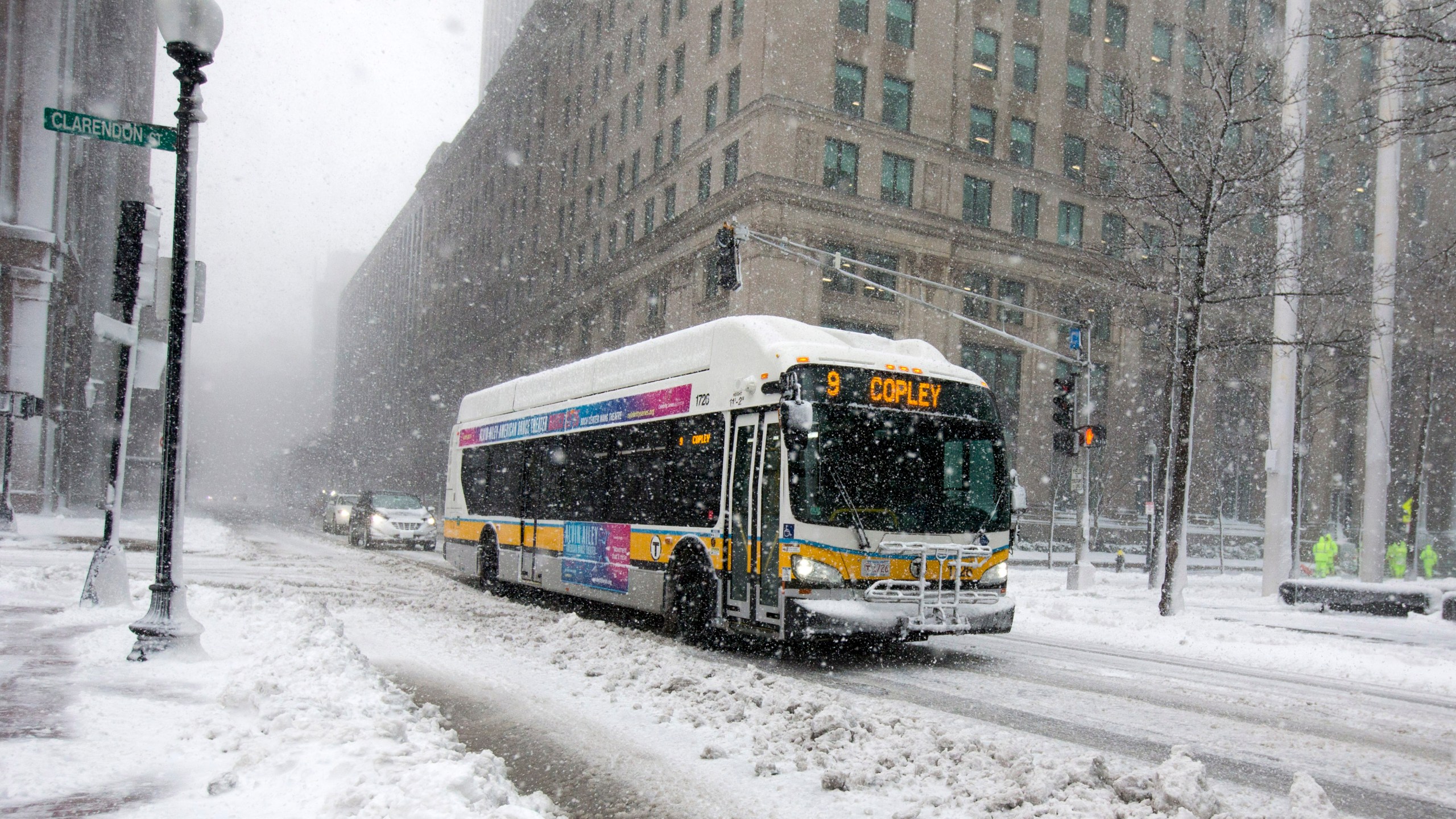 An MBTA bus makes it way down Stuart Street as Winter Storm Skylar bears down on March 13, 2018 in Boston, Mass. It was the third nor'easter to hit the area in less than two weeks. (Credit: Scott Eisen/Getty Images)