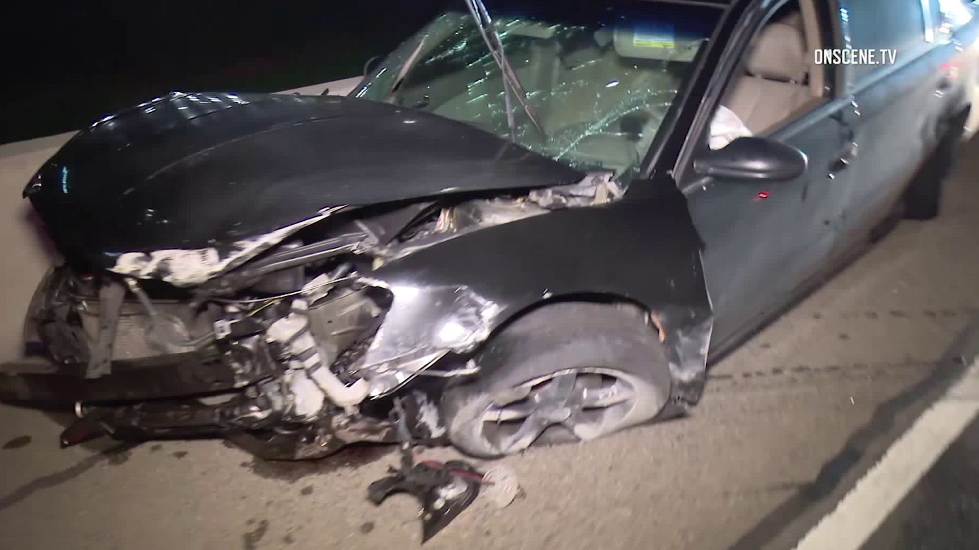 The vehicle of a man shot by Anaheim police on March 27, 2018 is seen after it crashed on the 405 Freeway during a pursuit. (Credit: Onscene.tv)