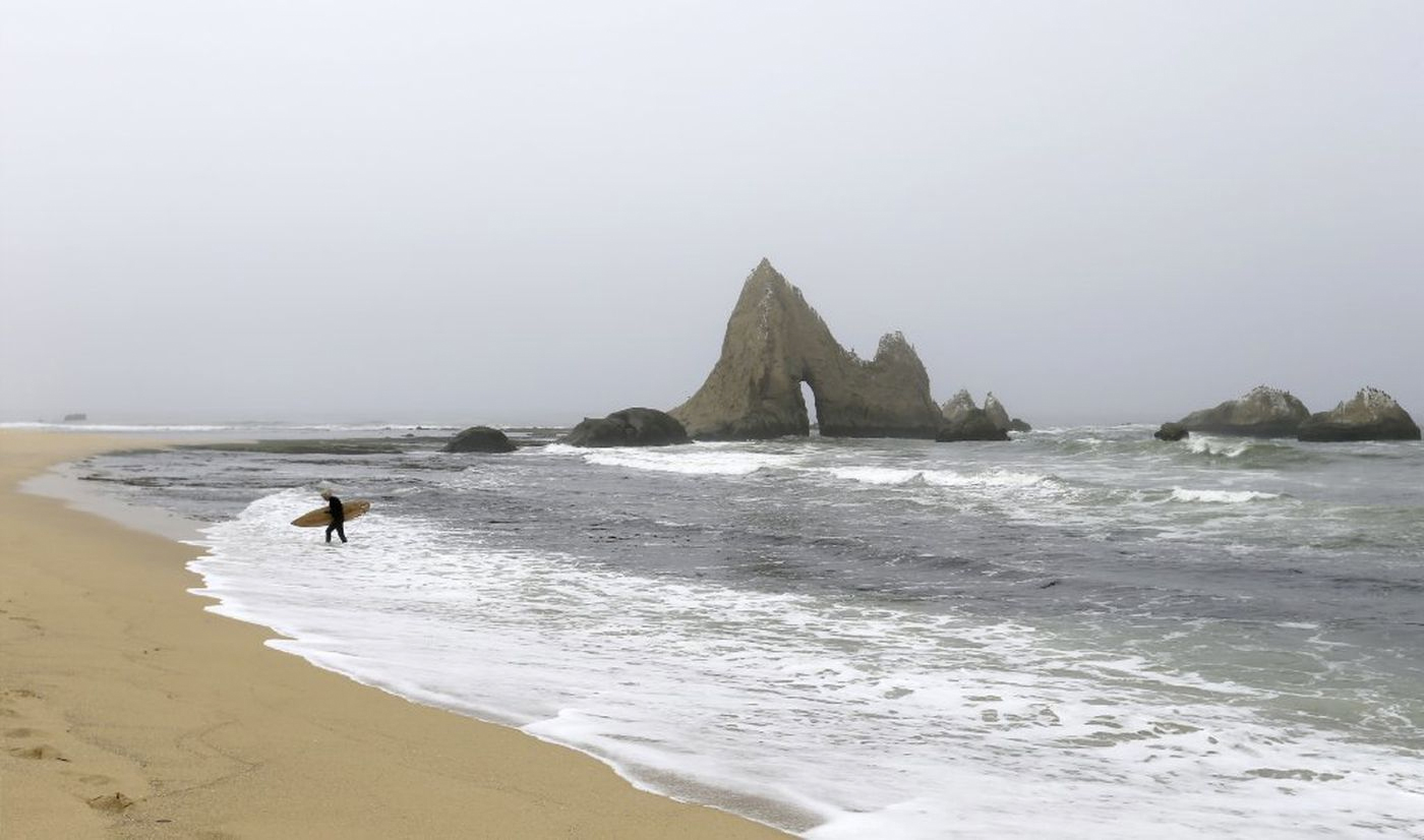 Shark's Tooth Rock at Martins Beach is a popular landmark for surfers and families who have visited the beach for generations. (Credit: Allen J. Schaben/Los Angeles Times)