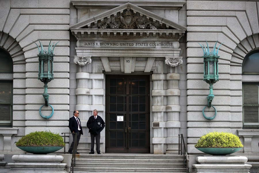 Security guards stand in front of the 9th U.S. Circuit Court of Appeals on June 12, 2017, in San Francisco. (Justin Sullivan/Getty Images)