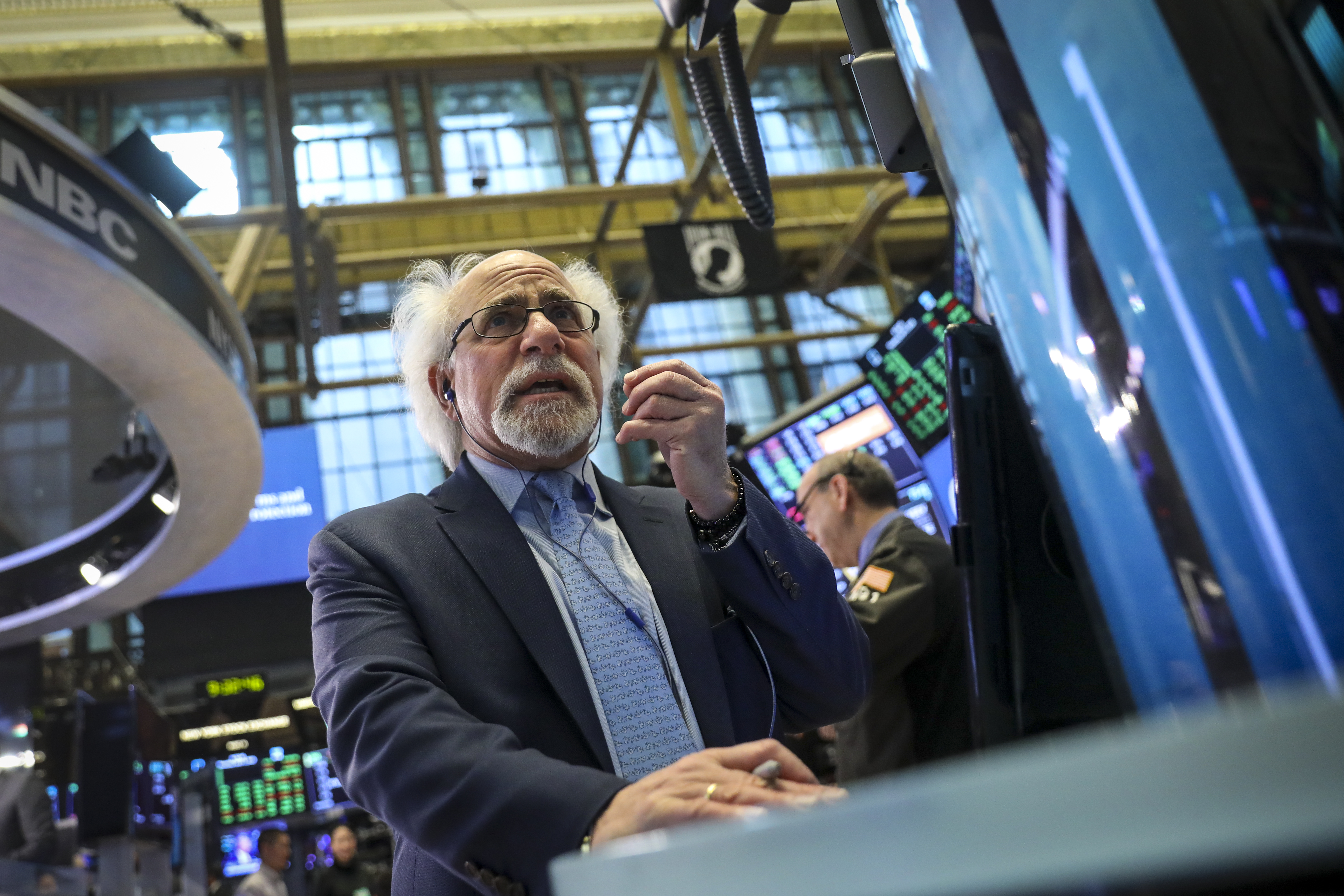 Traders and financial professionals work at the opening bell on the floor of the New York Stock Exchange, April 5, 2018. (Credit: Drew Angerer / Getty Images)