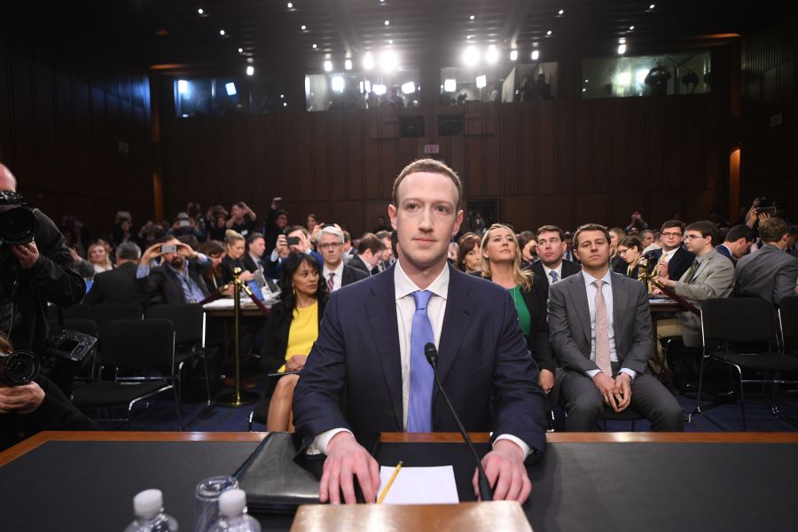 Facebook CEO Mark Zuckerberg arrives to testify before a joint hearing of the US Senate Commerce, Science and Transportation Committee and Senate Judiciary Committee on Capitol Hill, April 10, 2018. (Credit: Jim Watson/AFP/Getty Images)