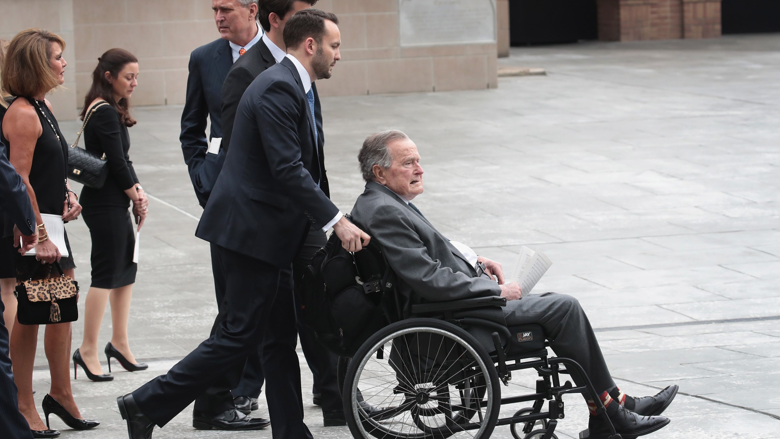 Former president George H.W. Bush leaves the funeral service of former first lady Barbara Bush at St. Martin's Episcopal Church in Houston on April 21, 2018. (Credit: Scott Olson / Getty Images)