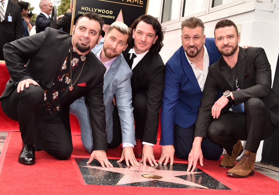 Chris Kirkpatrick, Lance Bass, JC Chasez, Joey Fatone and Justin Timberlake of *NSYNC are honored with a star on the Hollywood Walk of Fame on April 30, 2018. (Alberto E. Rodriguez/Getty Images)