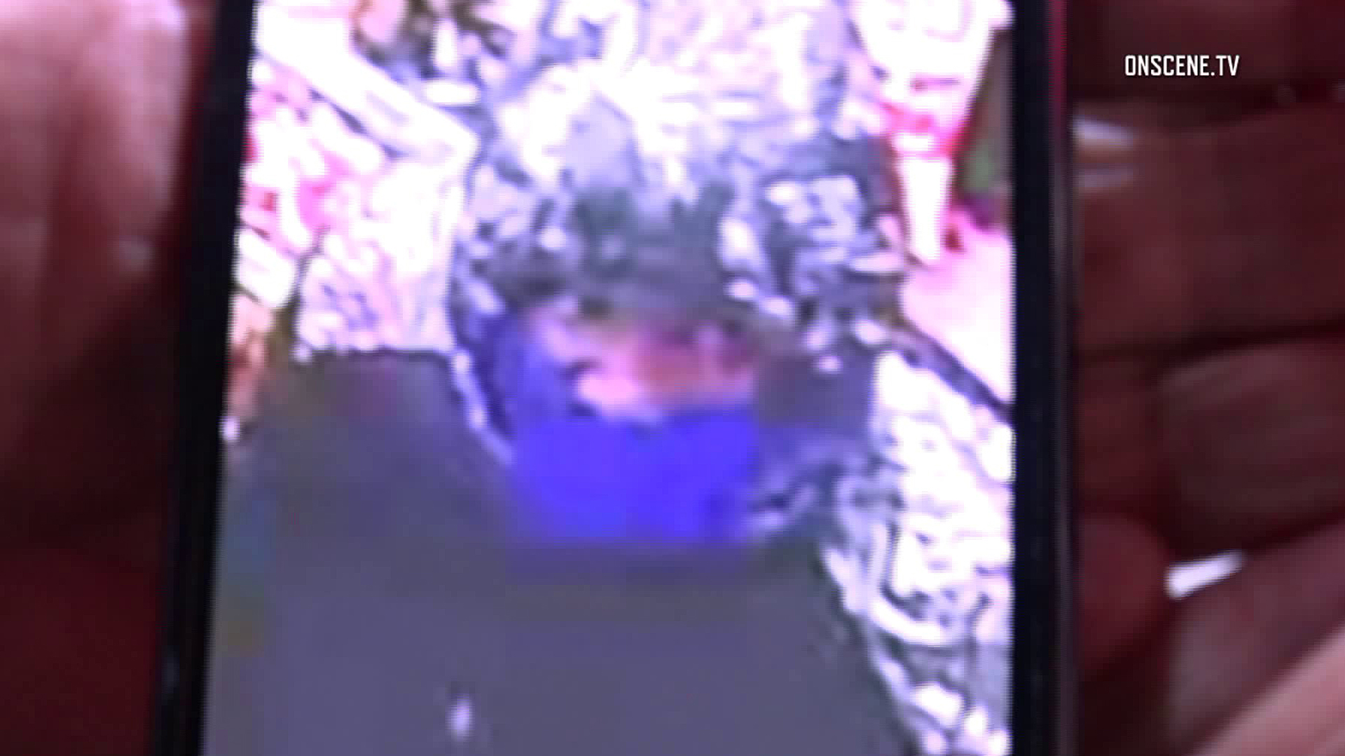 An armed robber at a Cypress 7-Eleven is seen in a surveillance image provided on April 25, 2018.