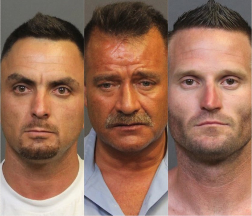 David Len Mcafee, left, Norman Michael Powers, center, and Brian Jay Bishop, right, are shown in booking photos released by the Costa Mesa Police Department on May 29, 2018.