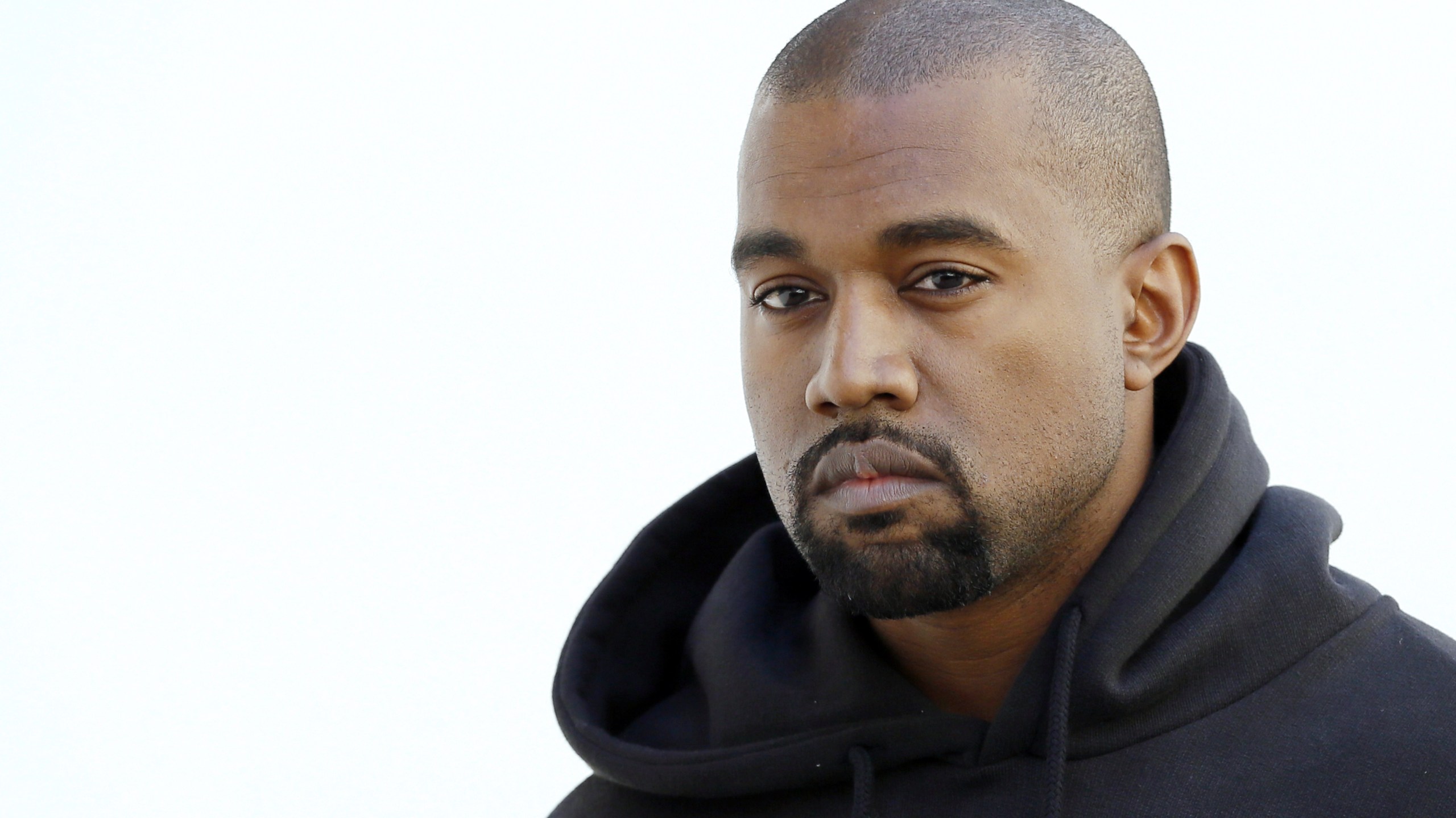 American rapper Kanye West poses before Christian Dior 2015-2016 fall/winter ready-to-wear collection fashion show on March 6, 2015, in Paris. (PATRICK KOVARIK/AFP/Getty Images)