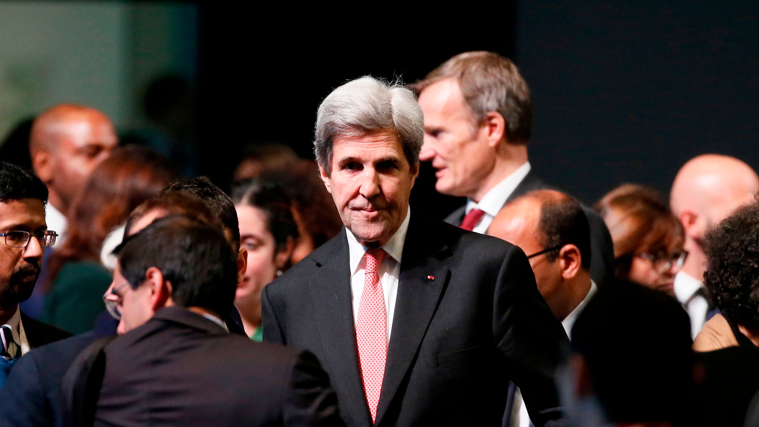 Former U.S. Secretary of State John Kerry arrives to attend the One Planet Summit on Dec. 12, 2017, at La Seine Musicale venue on the ile Seguin in Boulogne-Billancourt, southwest of Paris. (Credit: ETIENNE LAURENT/AFP/Getty Images)