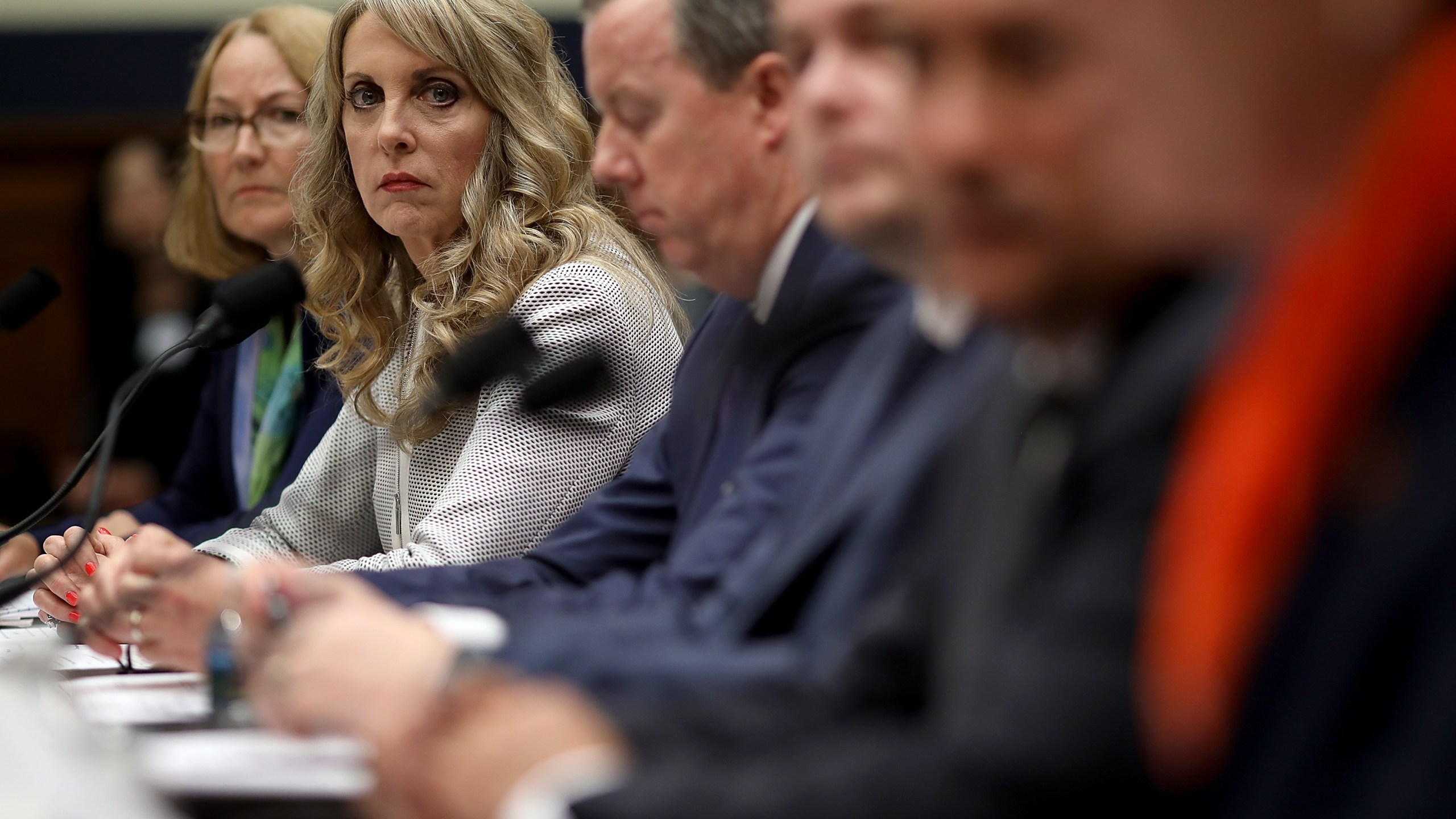 From left: Susanne Lyons, acting CEO of the United States Olympic Committee; Kerry Perry, president and CEO of USA Gymnastics; Tim Hinchey, president and CEO of USA Swimming; Steve McNally, executive director of USA Taekwondo; Jamie Davis, CEO of USA Volleyball and Shellie Pfohl, president and CEO of the U.S. Center for SafeSport testify before the House Oversight and Investigations Subcommittee May 23, 2018 in Washington, D.C. (Credit: Win McNamee/Getty Images)