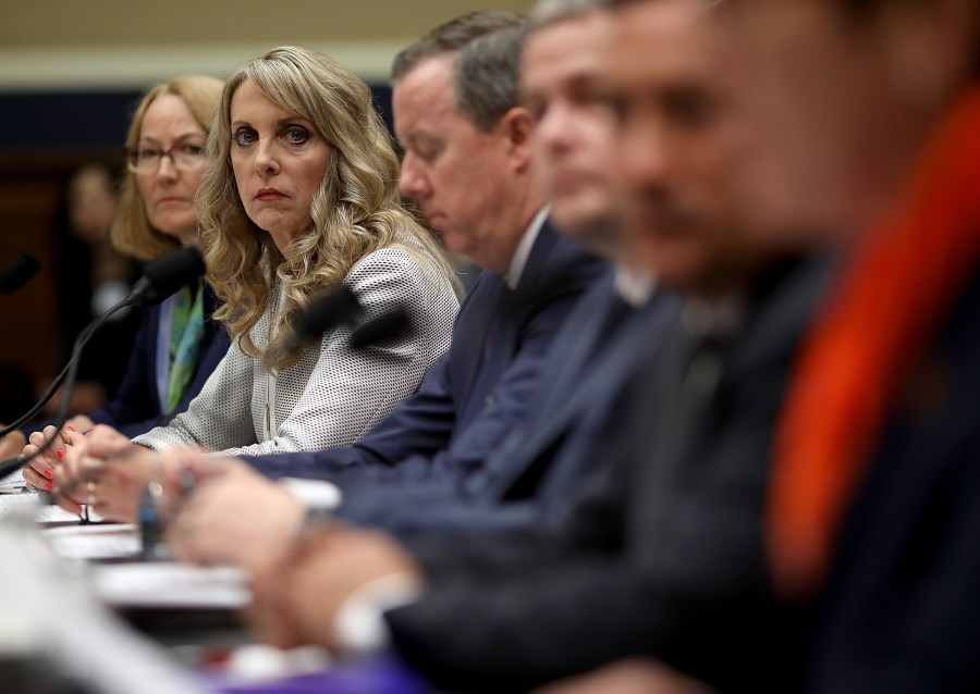 From left: Susanne Lyons, acting CEO of the United States Olympic Committee; Kerry Perry, president and CEO of USA Gymnastics; Tim Hinchey, president and CEO of USA Swimming; Steve McNally, executive director of USA Taekwondo; Jamie Davis, CEO of USA Volleyball and Shellie Pfohl, president and CEO of the U.S. Center for SafeSport testify before the House Oversight and Investigations Subcommittee May 23, 2018 in Washington, D.C. (Credit: Win McNamee/Getty Images)