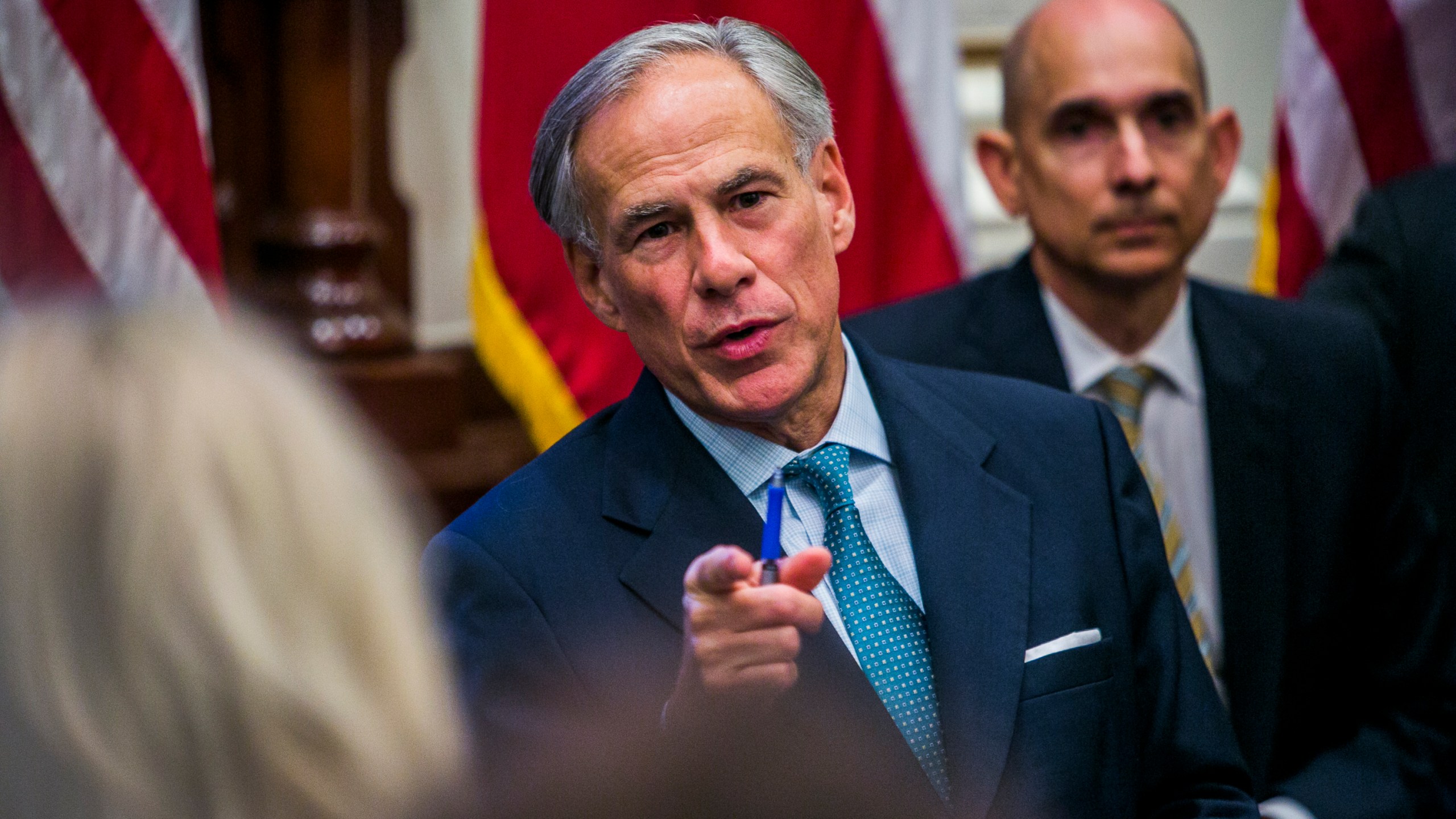 Texas Gov. Greg Abbott holds a roundtable discussion with victims, family, and friends affected by the Santa Fe, Texas school shooting at the state capital on May 24, 2018, in Austin, Texas. (Credit: Drew Anthony Smith/Getty Images)