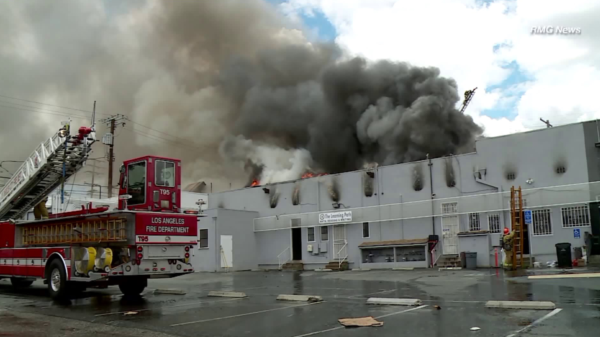 Firefighters respond to a fire at a strip mall in Mar Vista on May 22, 2018. (Credit: RMG News)