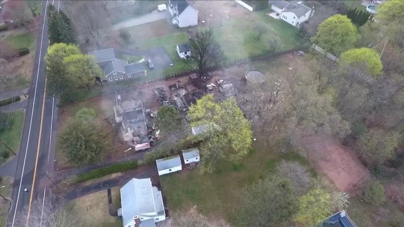 At least six police officers were injured in an explosion late Wednesday when they responded to a report about a man holding his wife hostage, a North Haven, Connecticut, city official said. (Credit: WFSB)