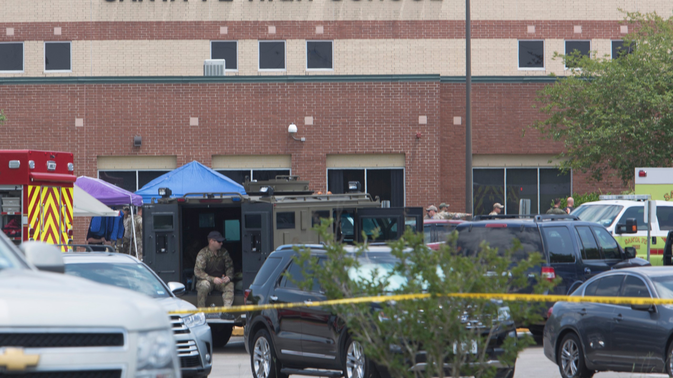 Emergency crews gather in the parking lot of Santa Fe High School where 10 people were killed on May 18, 2018 in Santa Fe, Texas. (Credit: Daniel KramerAFP/Getty Images)