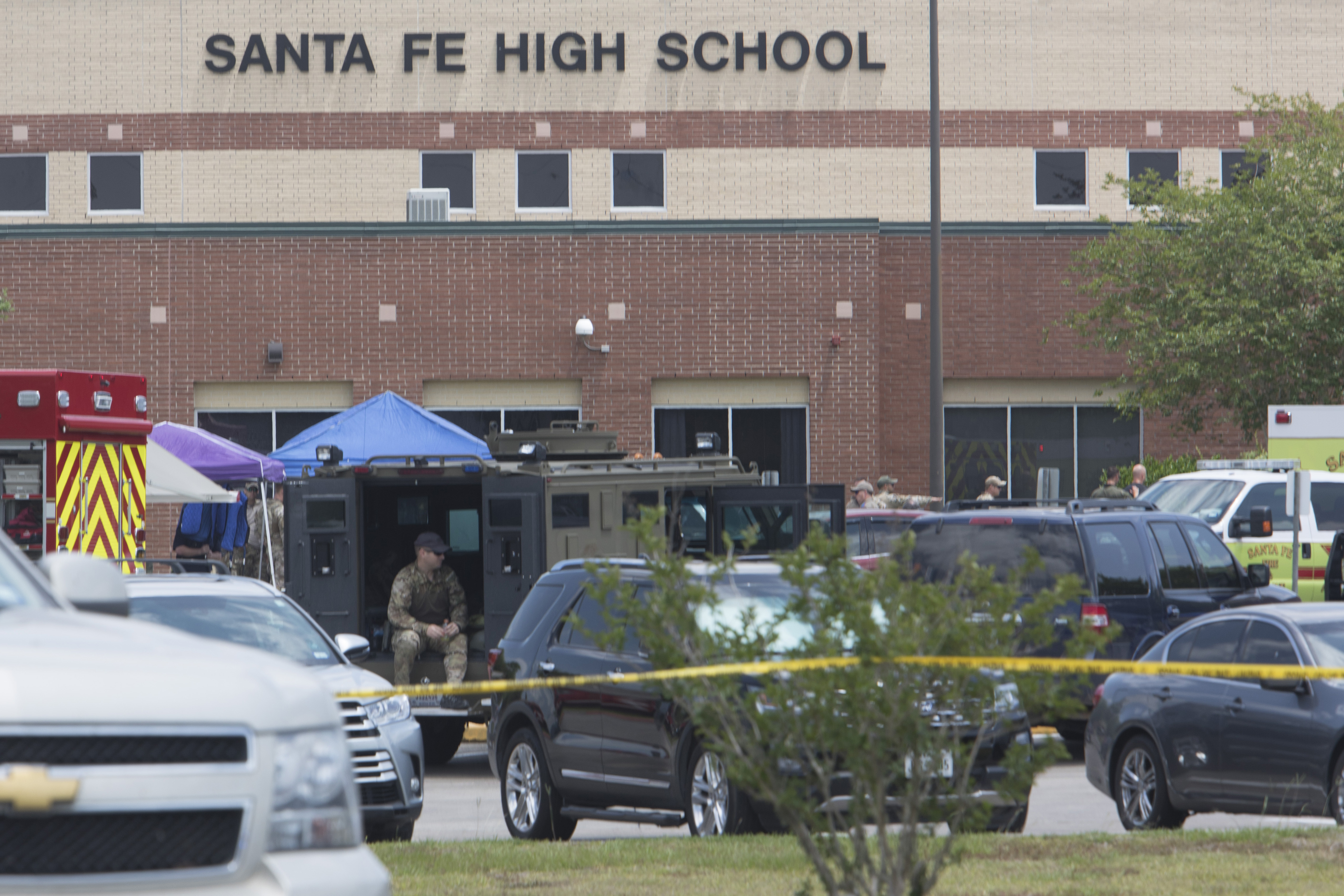 Emergency crews gather in the parking lot of Santa Fe High School where 10 people were killed on May 18, 2018 in Santa Fe, Texas. (Credit: Daniel KramerAFP/Getty Images)