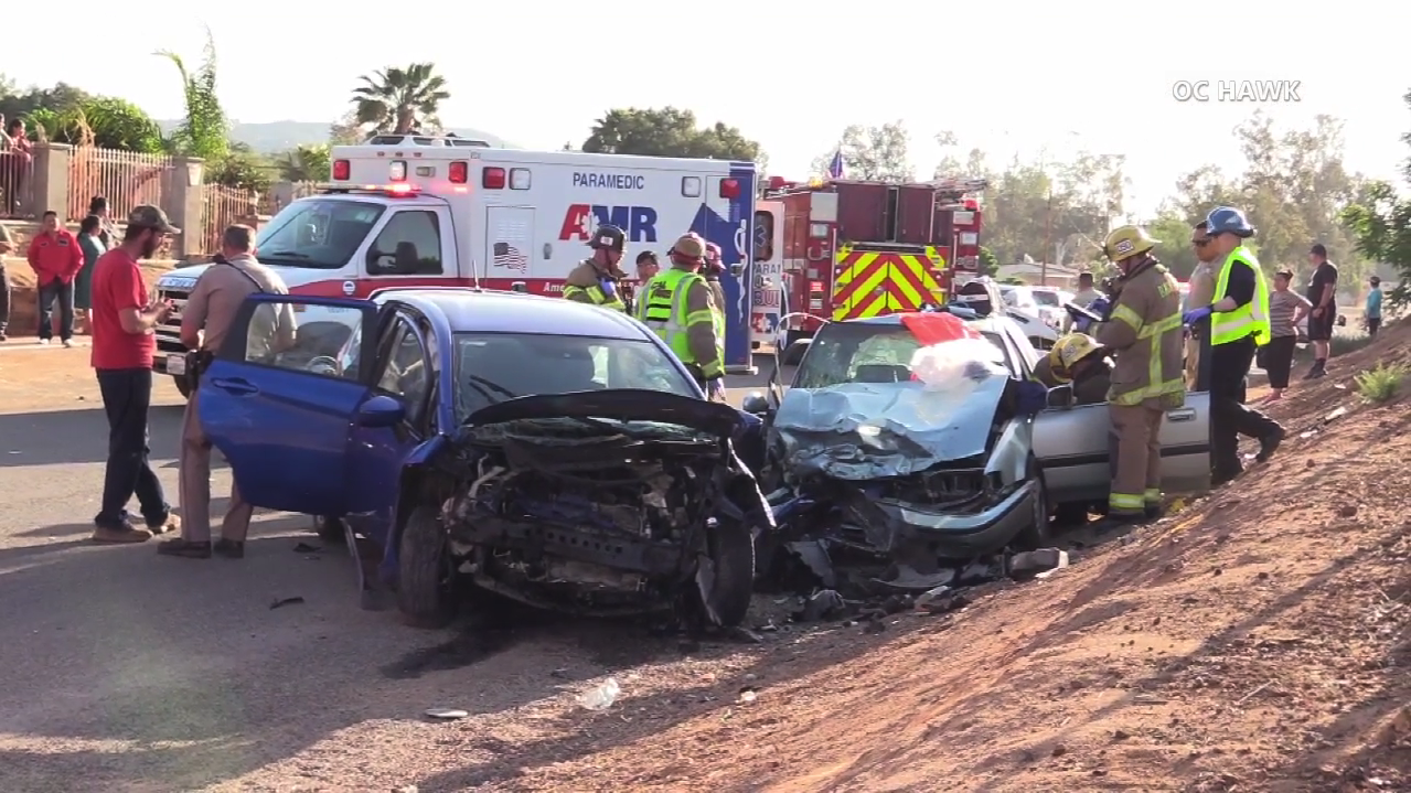 Paramedics respond to the scene where two young boys were killed after the car they were in was hit by another vehicle involved in a street race in Mead Valley on May 15, 2018. (Credit: OC Hawk)